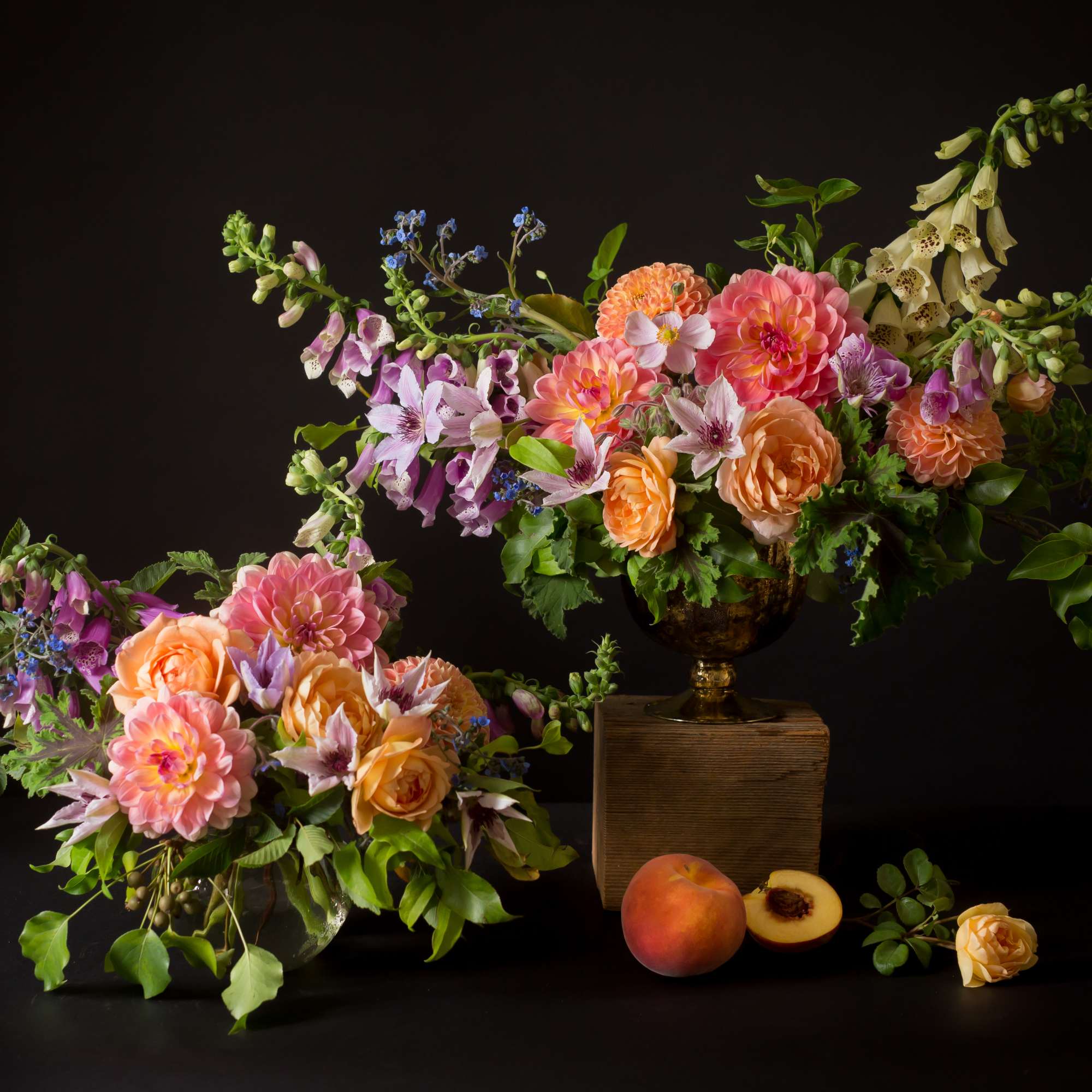 Two floral arrangements with pink and peach blooms on a dark background