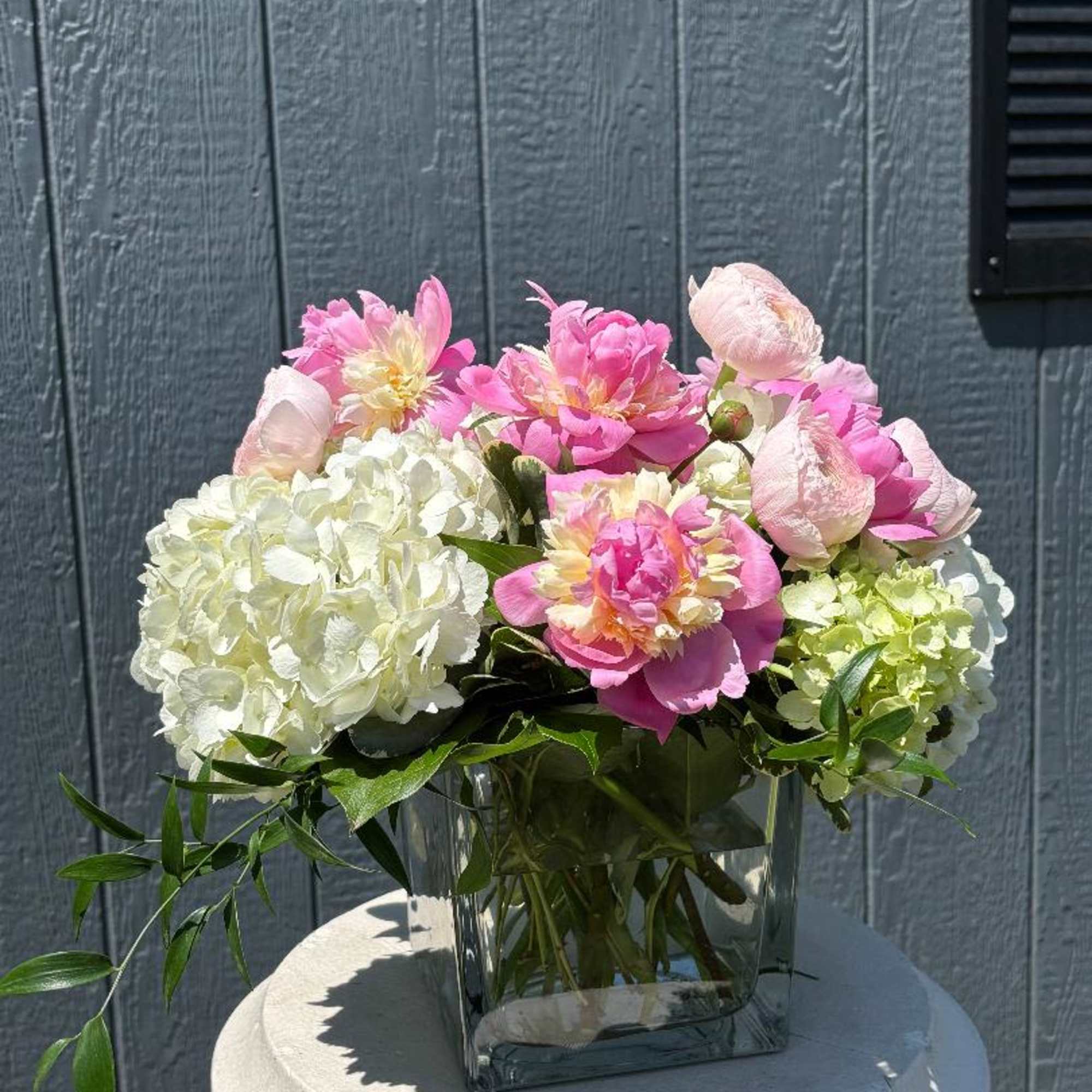 Meet Pretty in Peony&mdash;a soft, romantic arrangement designed to make a statement.