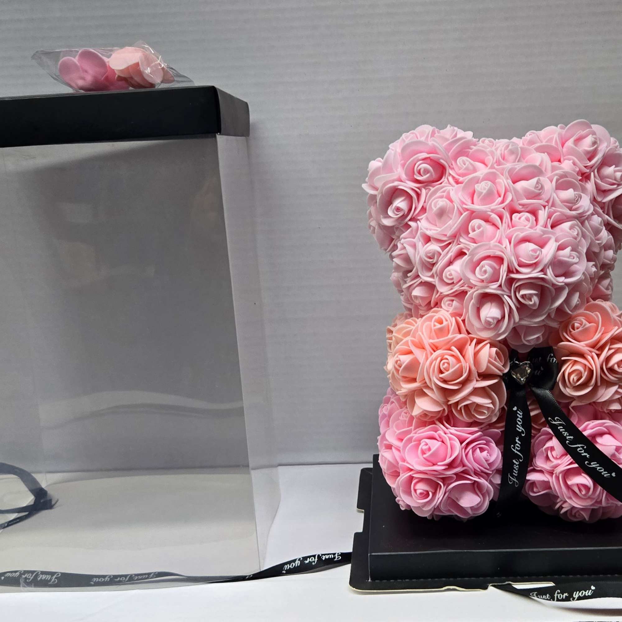 Pink rose teddy bear gift with a clear display box