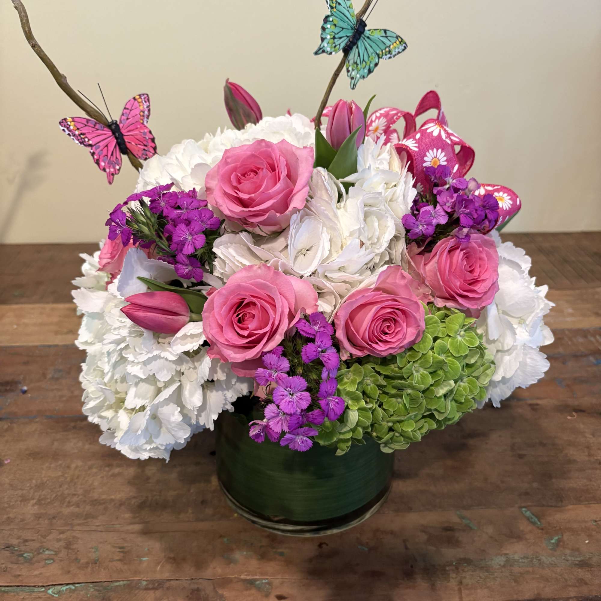 Butterfly&rsquo;s with assorted hydrangeas, roses and tulips