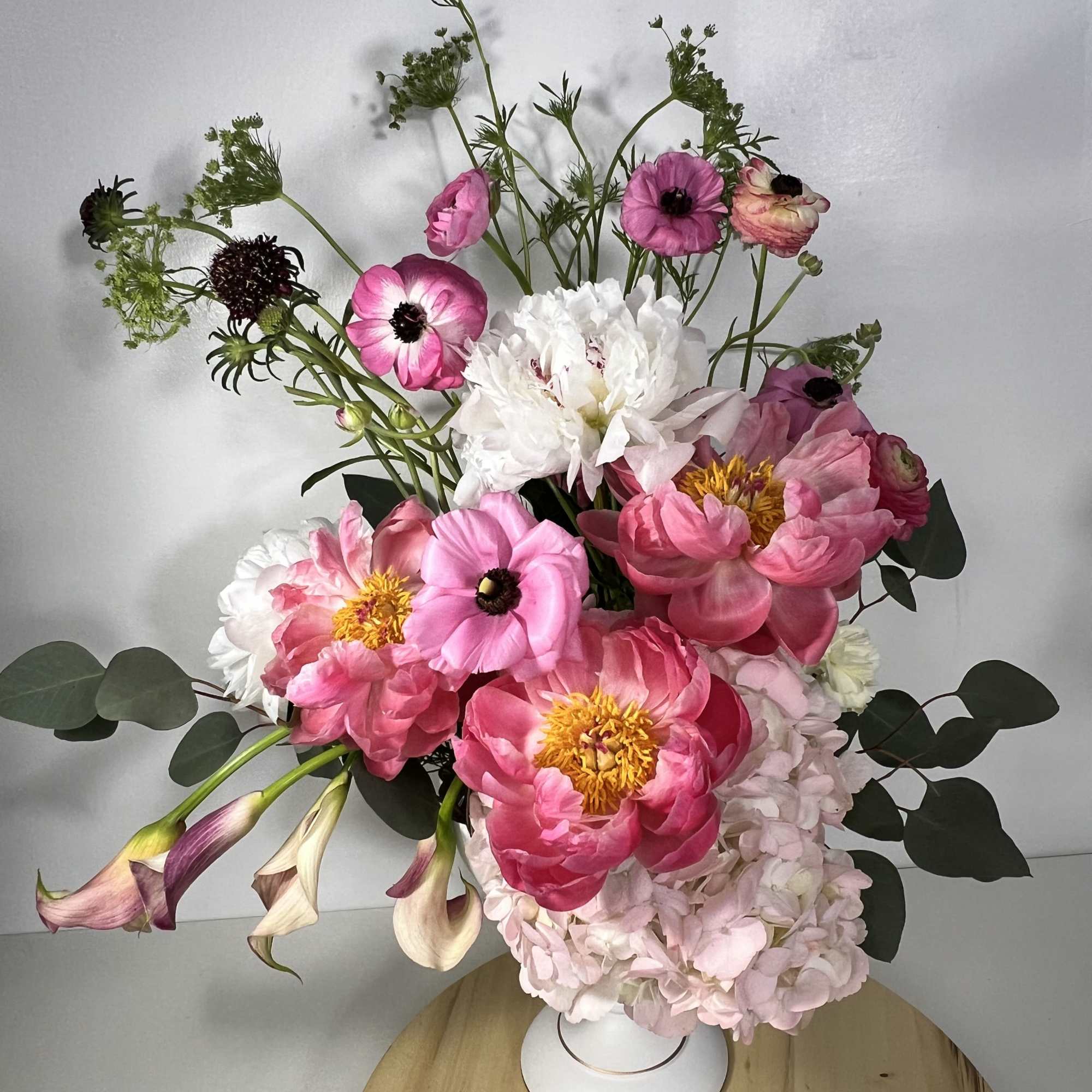 Soft, garden-fresh peonies set the tone for this Blush Muse bouquet -