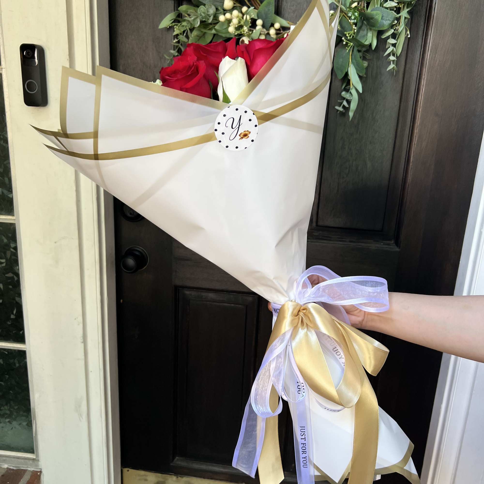 A timeless bouquet featuring 10 premium red roses and 10 elegant white