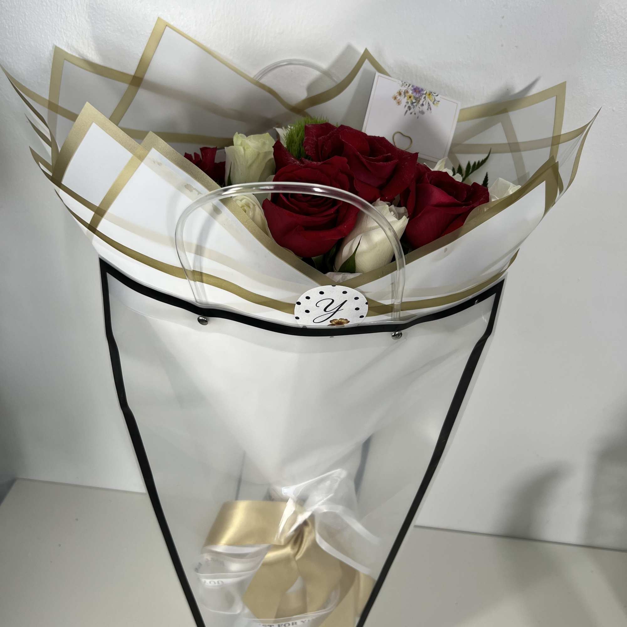 A timeless bouquet featuring 10 premium red roses and 10 elegant white