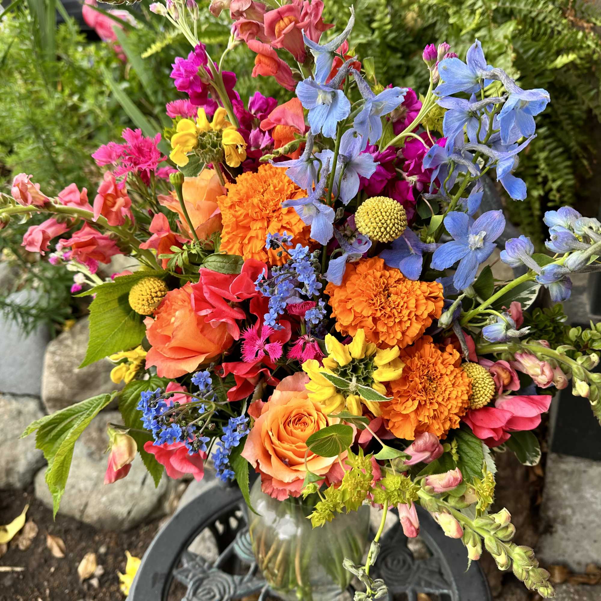 Colorful mixed bouquet in a clear glass vase