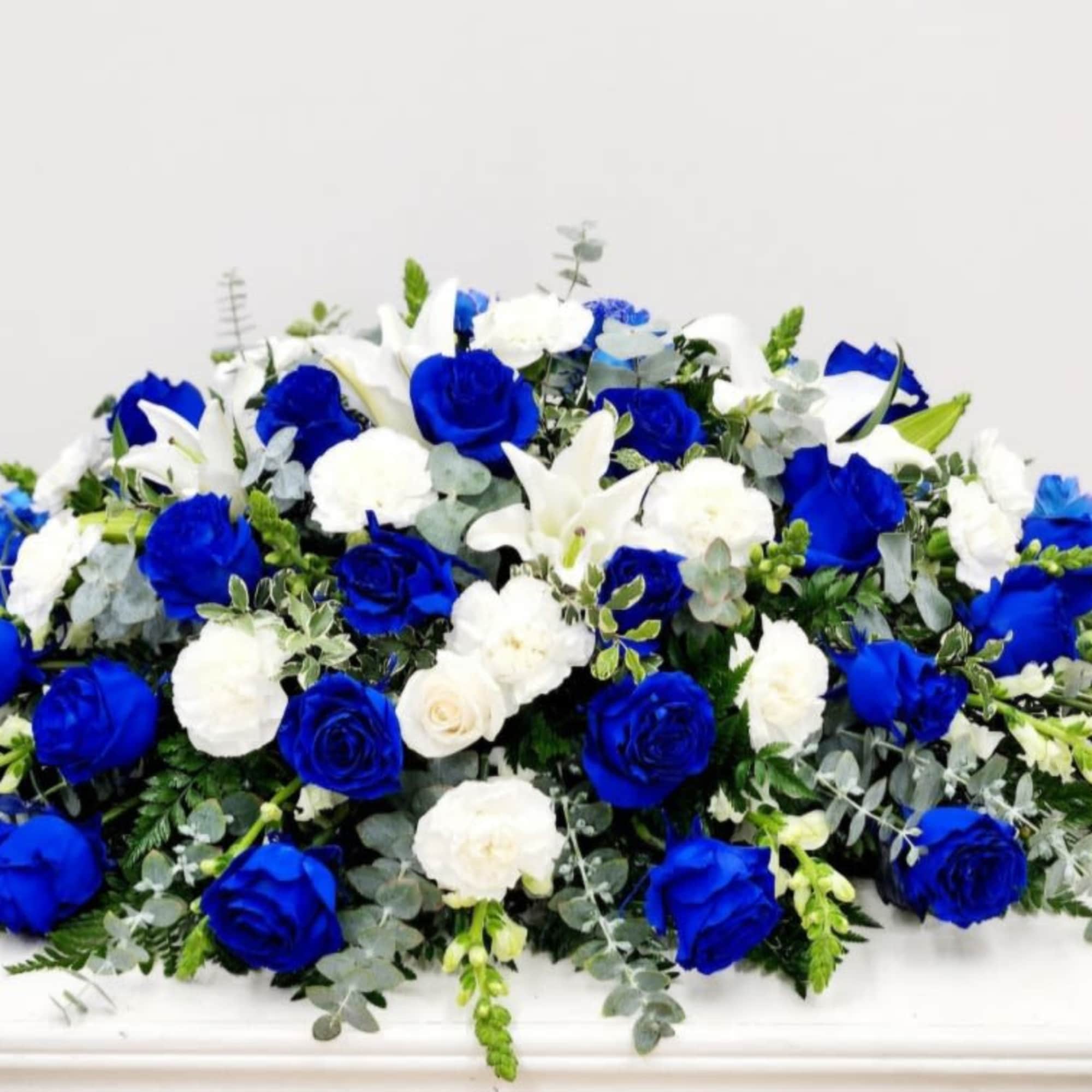 Royal-blue and white blooms form a serene, dignified spread perfect for a