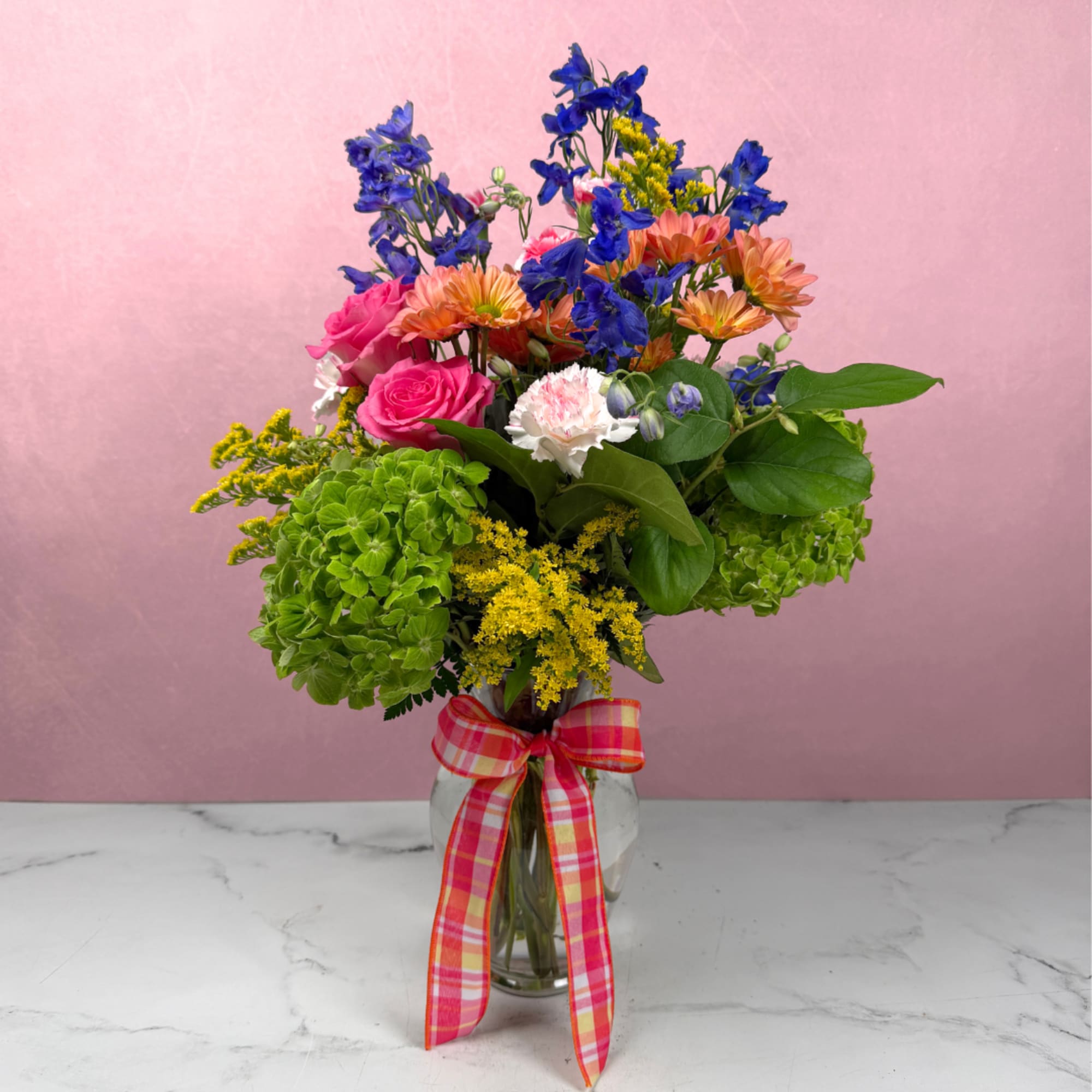 Make someone's day with our Spring Surprise! This lovely arrangement is a