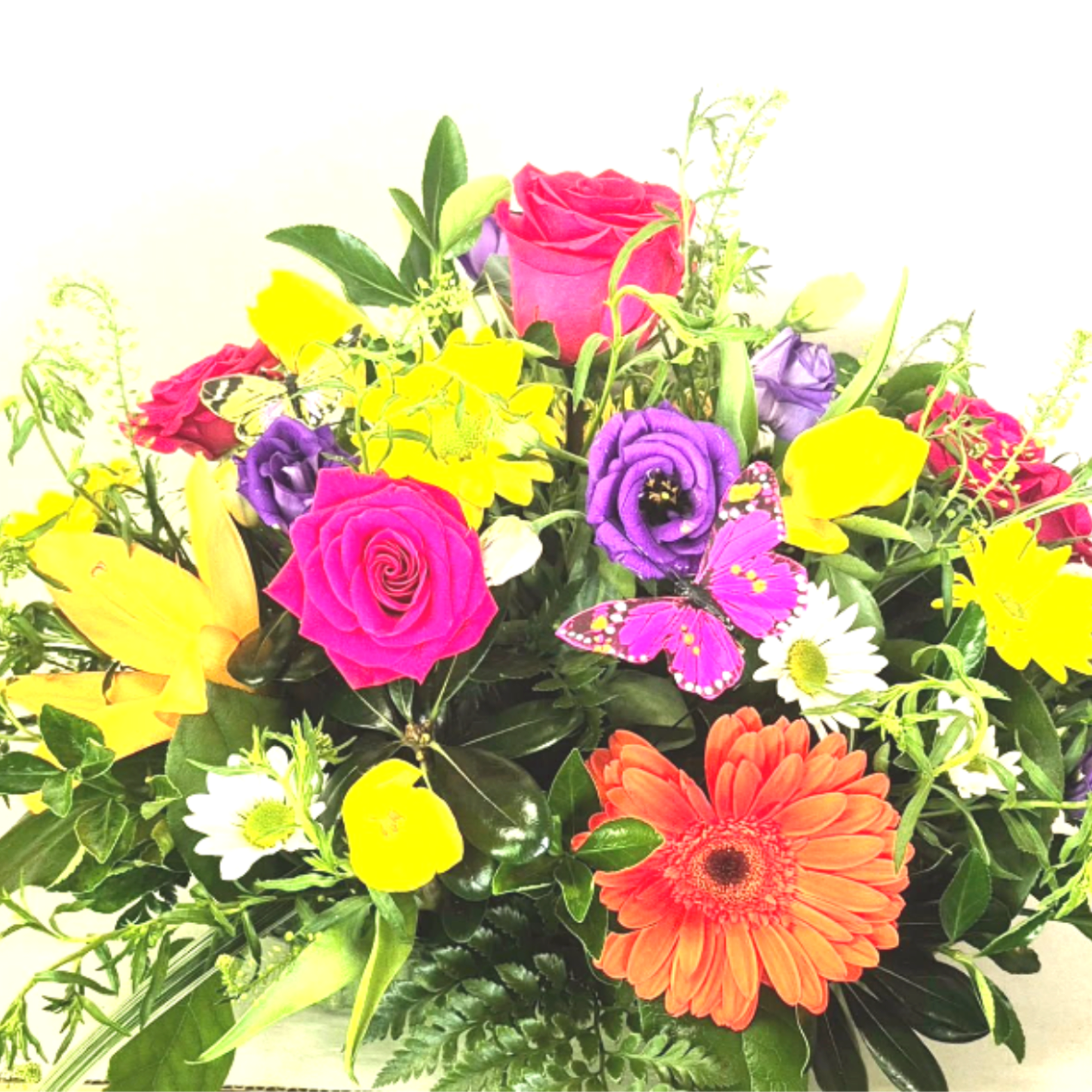 Beautiful mixed Flowers, Roses and More in a recycled fresh basil container