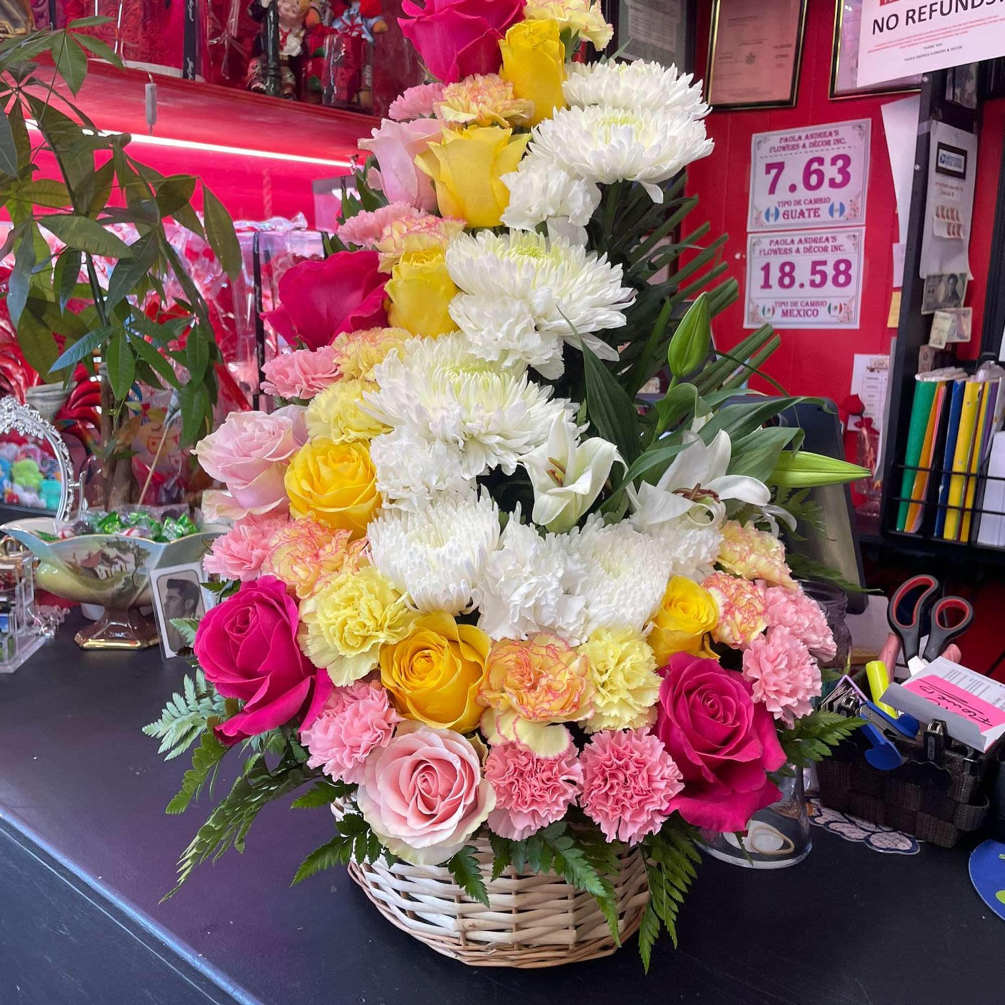 A tall vertical basket arrangement perfect for any heartwarming gift or mix