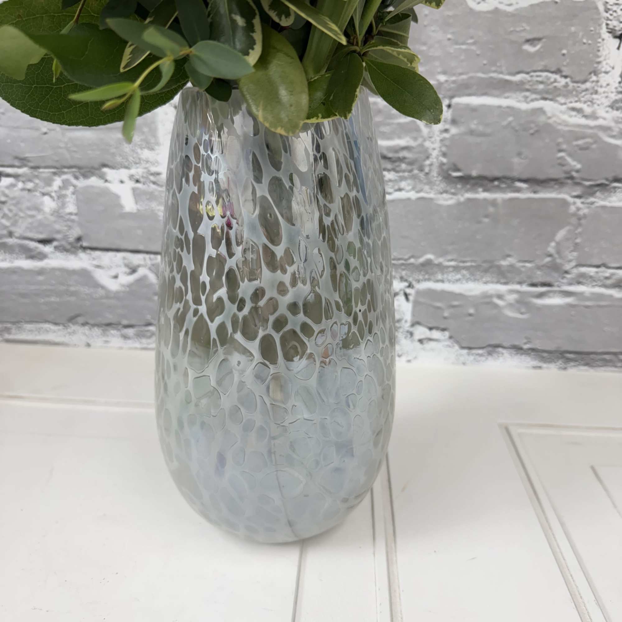 Gorgeous hand-blown vase with a white iridescent finish! Beautiful yellow, white and