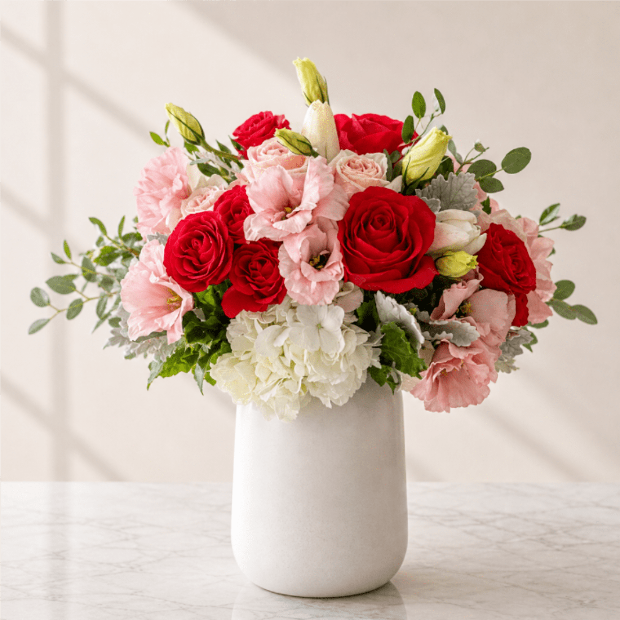 Radiant Romance is a luxurious, garden-style flower arrangement designed to make a
