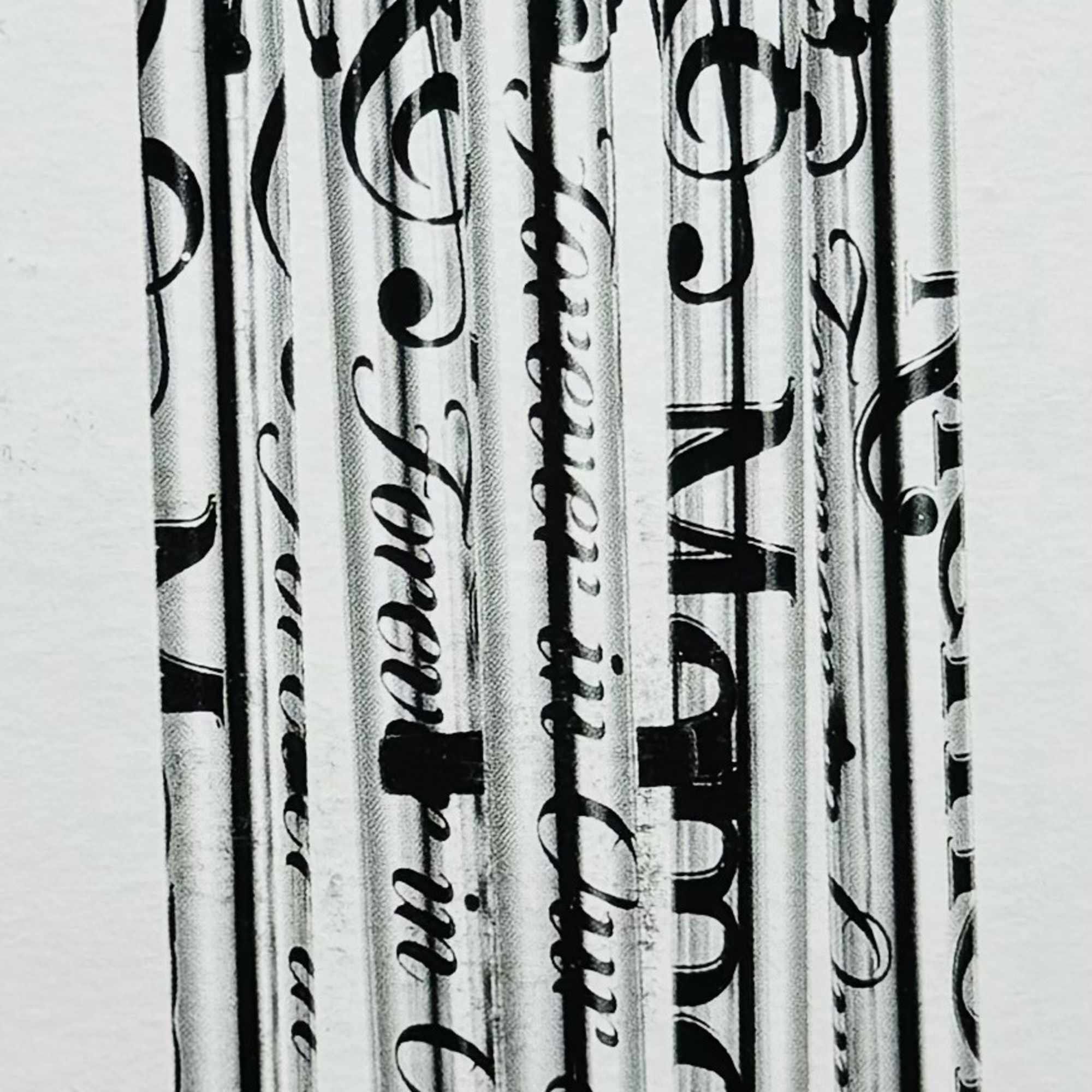 A lyrical stainless steel wind chime engraved with the words "Memories" and