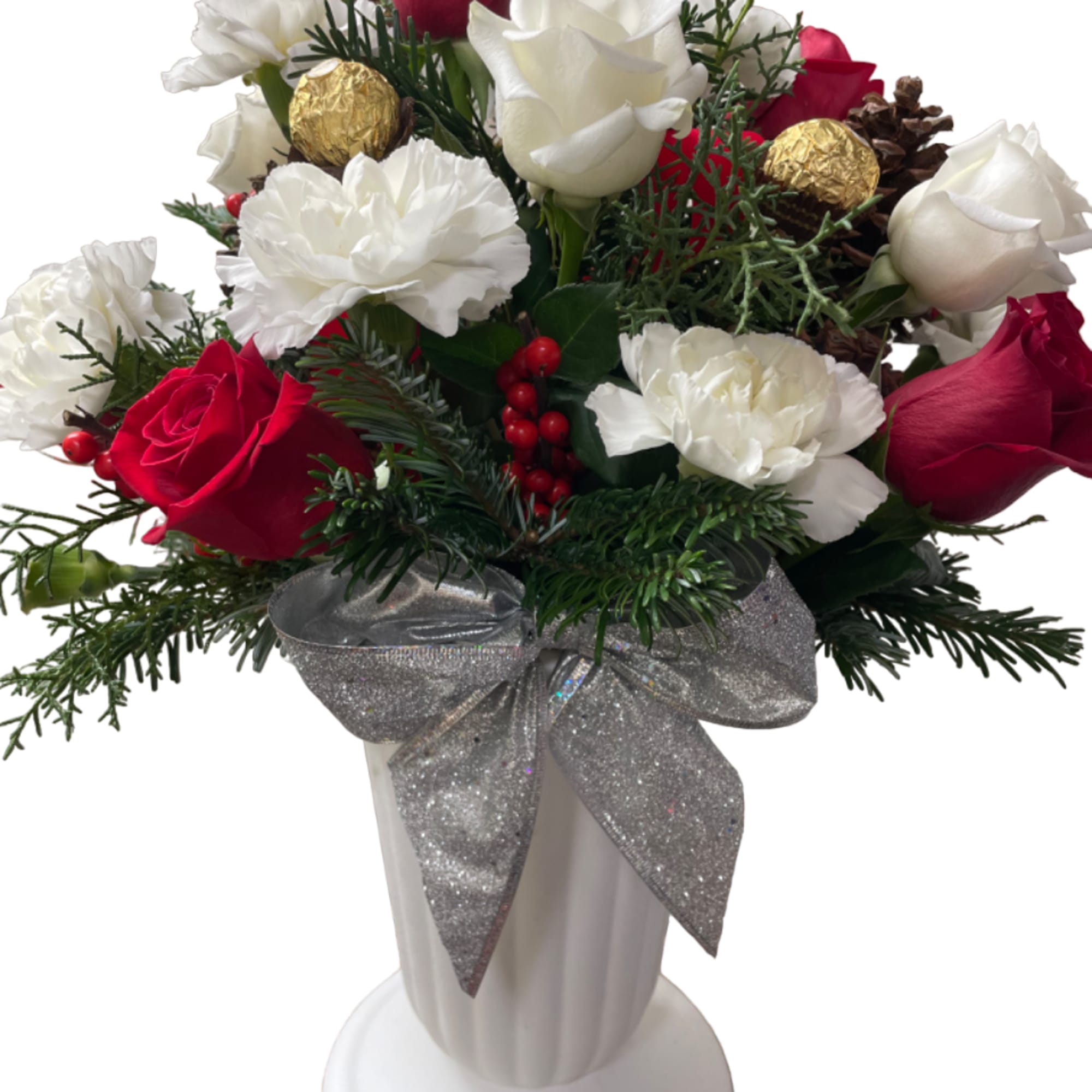 Red and white roses with carnations in a white vase with a silver bow