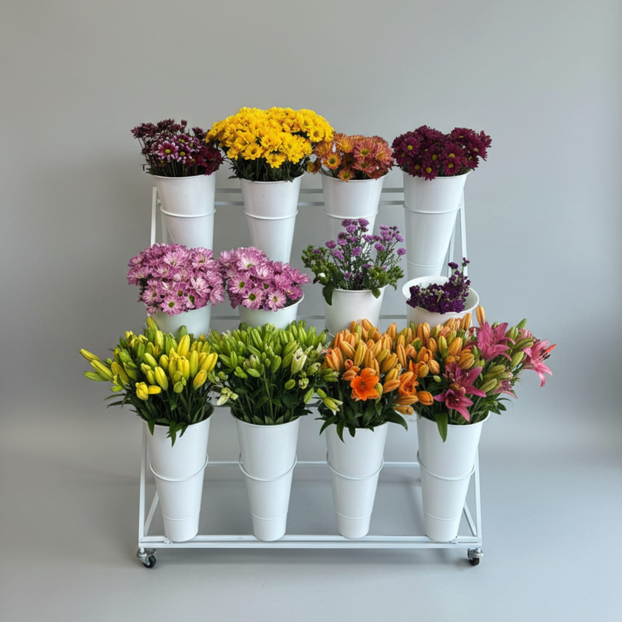 A tiered market-style flower bar that turns event d&eacute;cor into an interactive