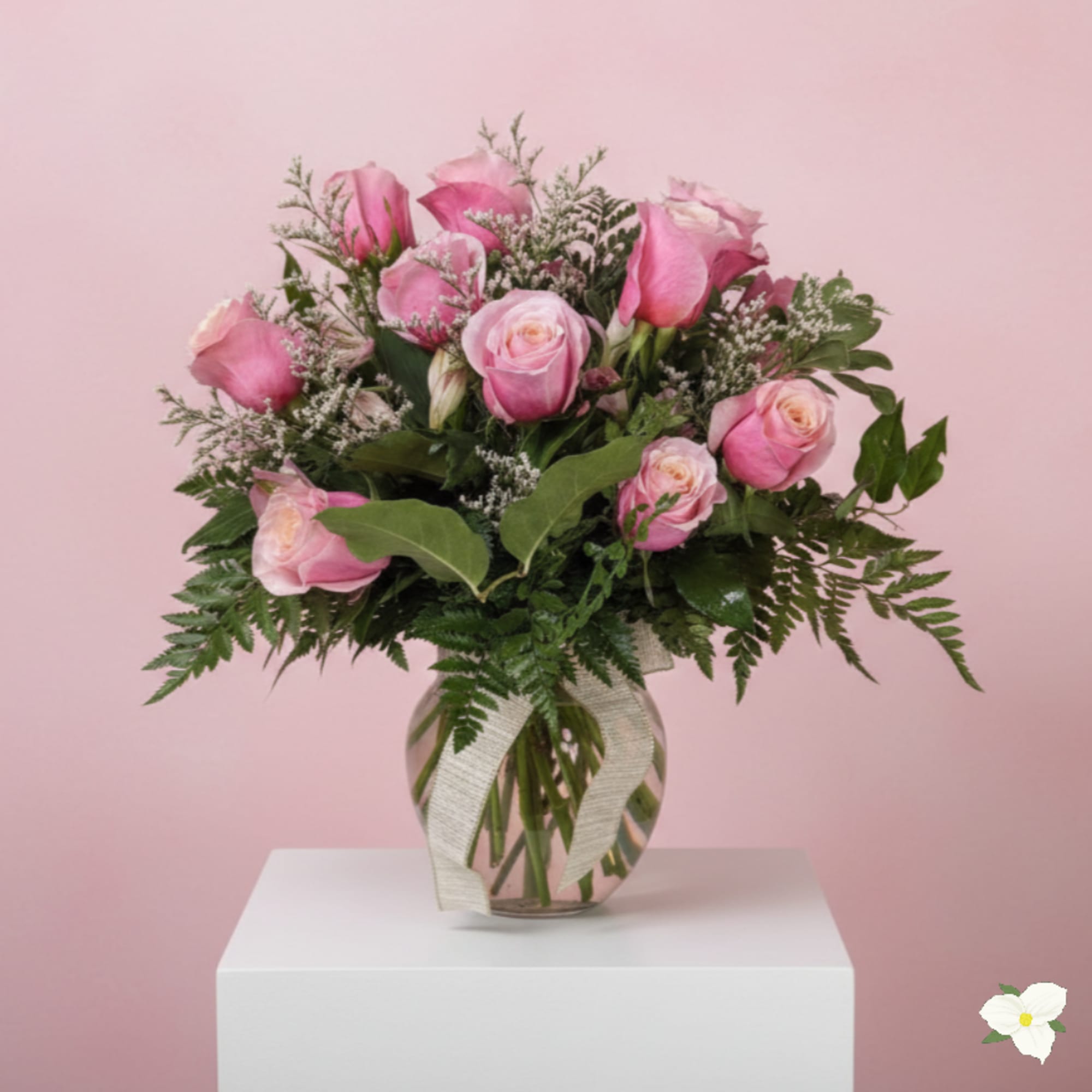 Nothing says romance quite like a dozen pink roses. This classic bouquet