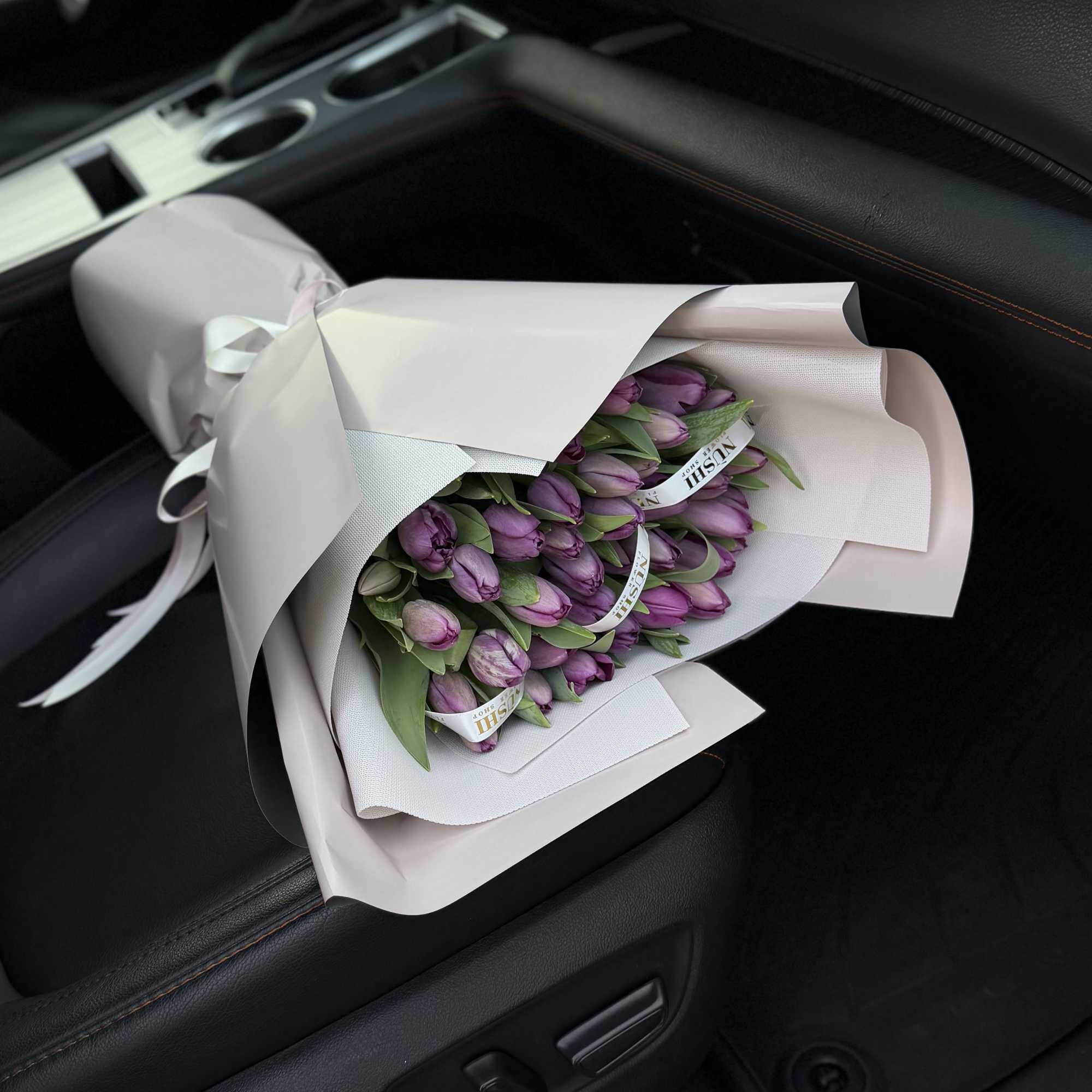A fresh and vibrant tulip arrangement, carefully designed to match the original