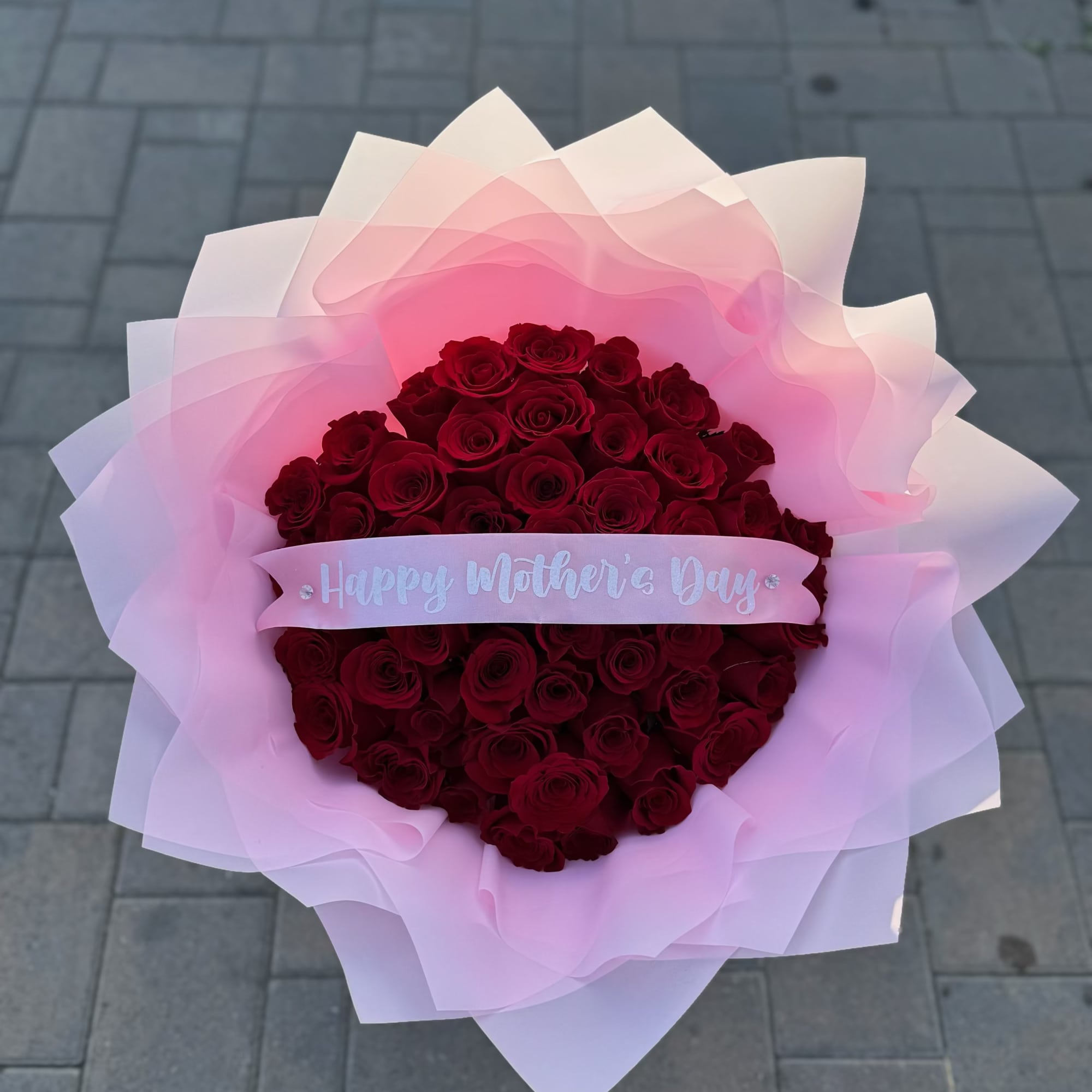 Red Roses with your choice of wrapper color and Happy Mother's Day