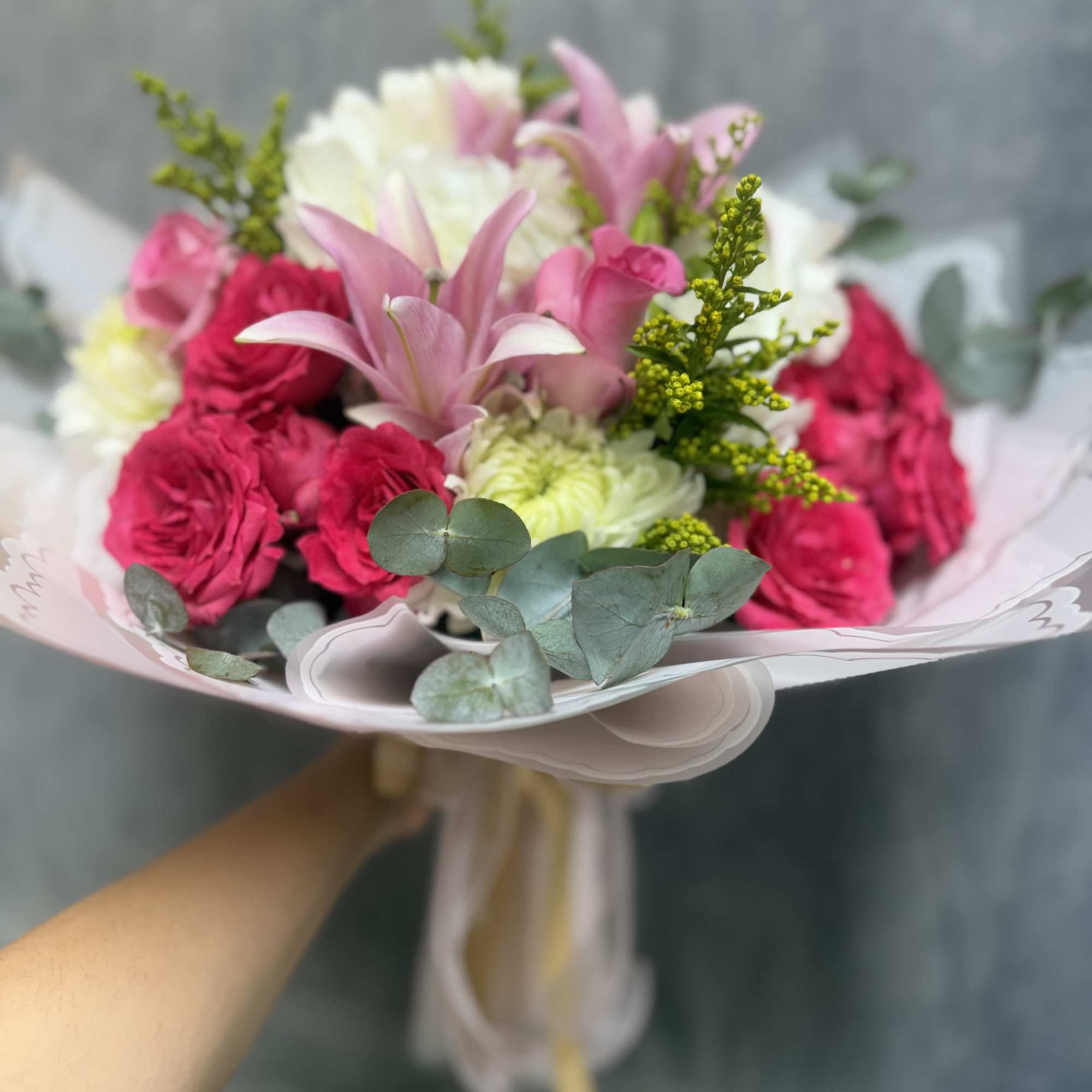 An enchanting mix of pure white mums and hydrangeas paired with shades