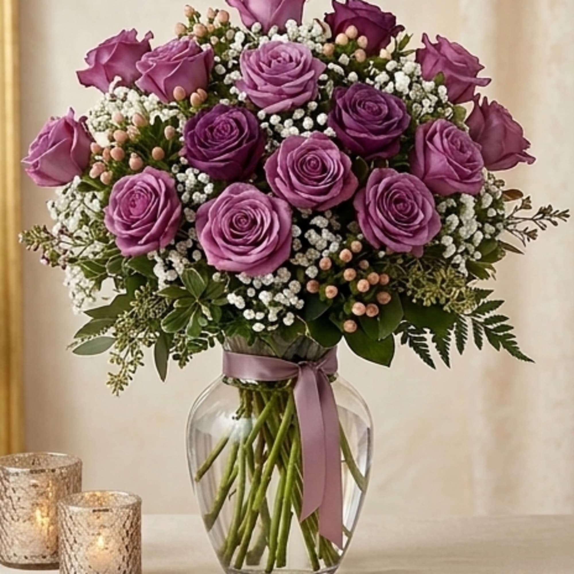 PURPLE/LAVENDER ROSES ARRANGED IN A VASE, WITH GREENS AND FILLERS, IF YOU