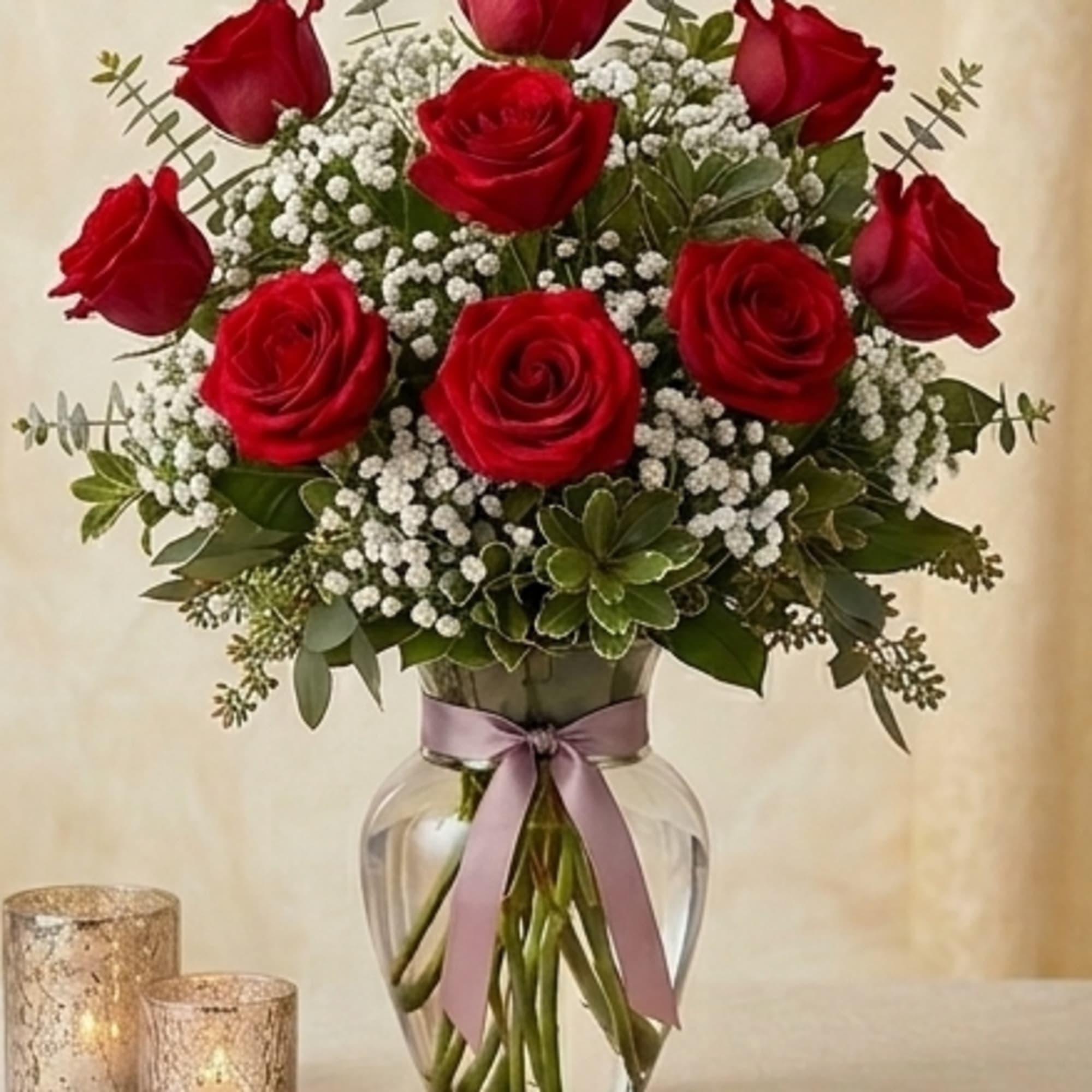 Long-stemmed red roses, that makes a statement! This vase is packed with