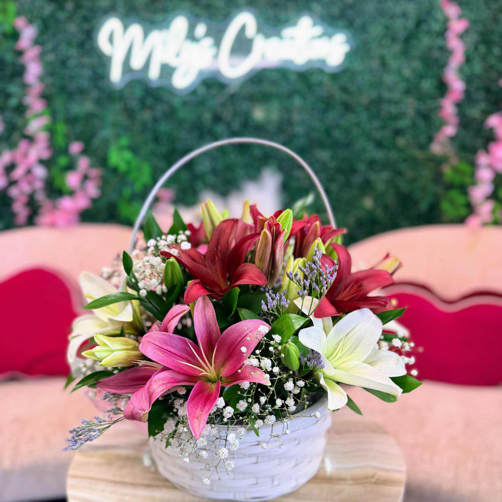 A charming wooden basket filled with a radiant mix of colorful lilies