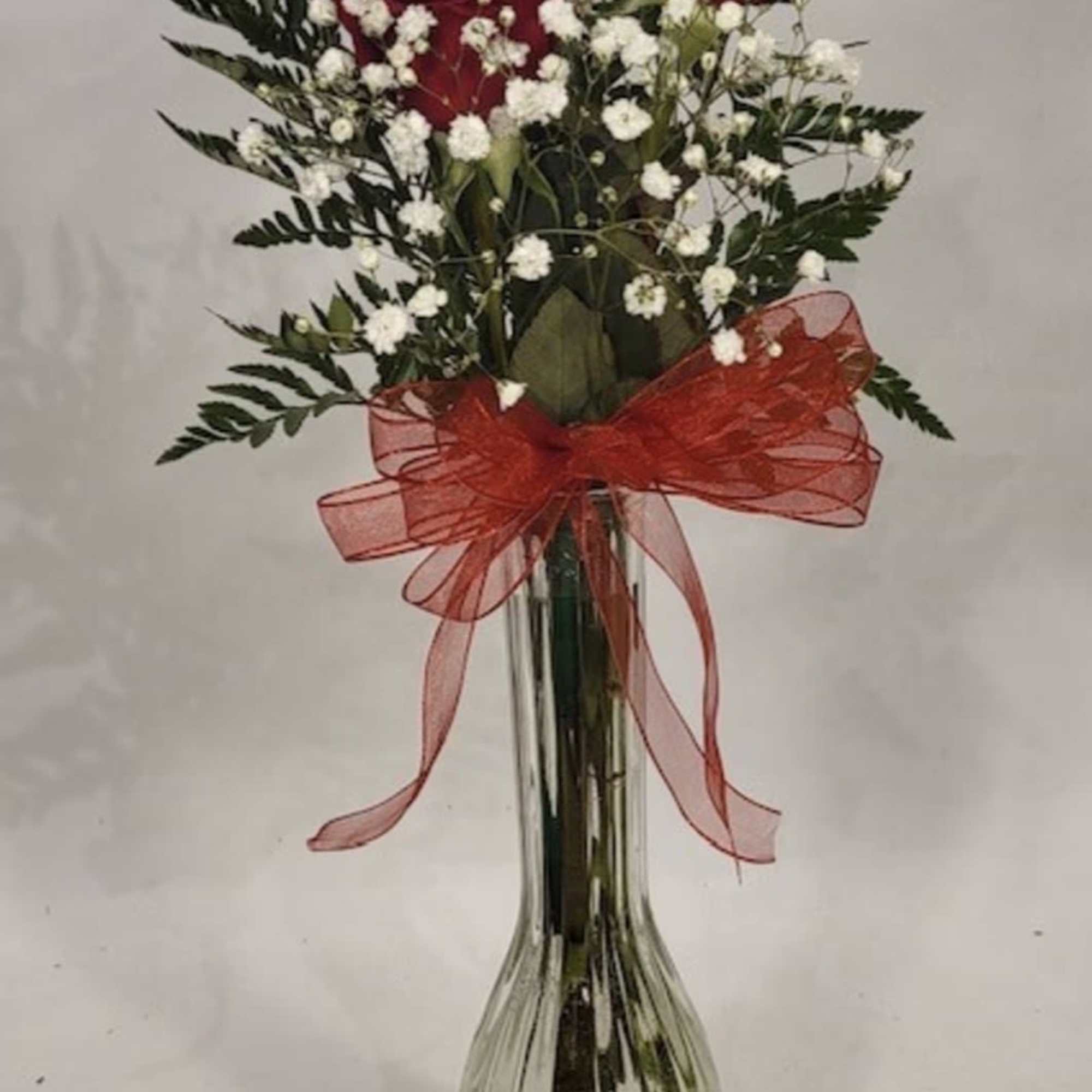 Beautiful bad vase with roses and fillers 
Standard 1 single
Rose 
Deluxe 2