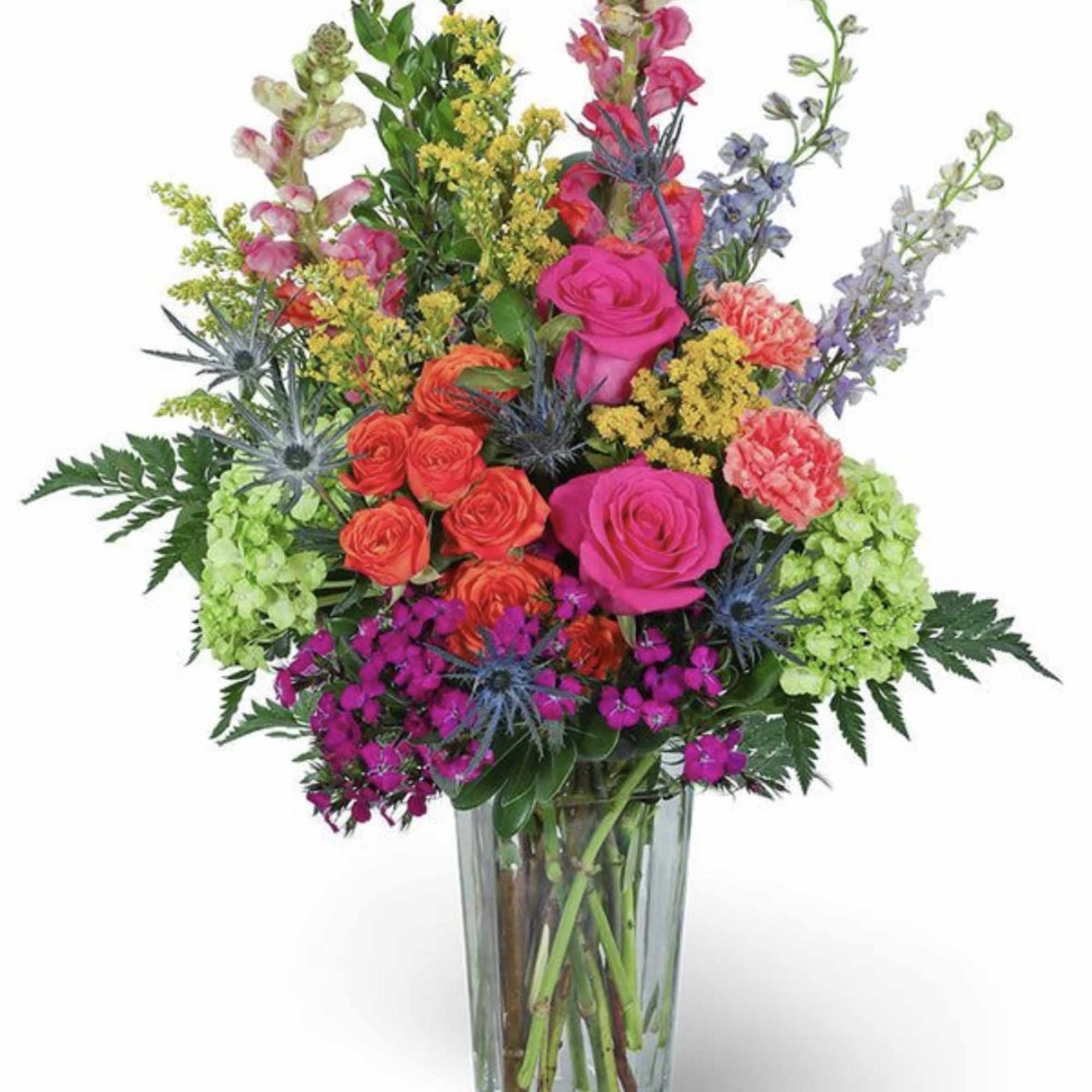 Bright, garden-fresh color greets the eye in this Sweet sunrise flower arrangement