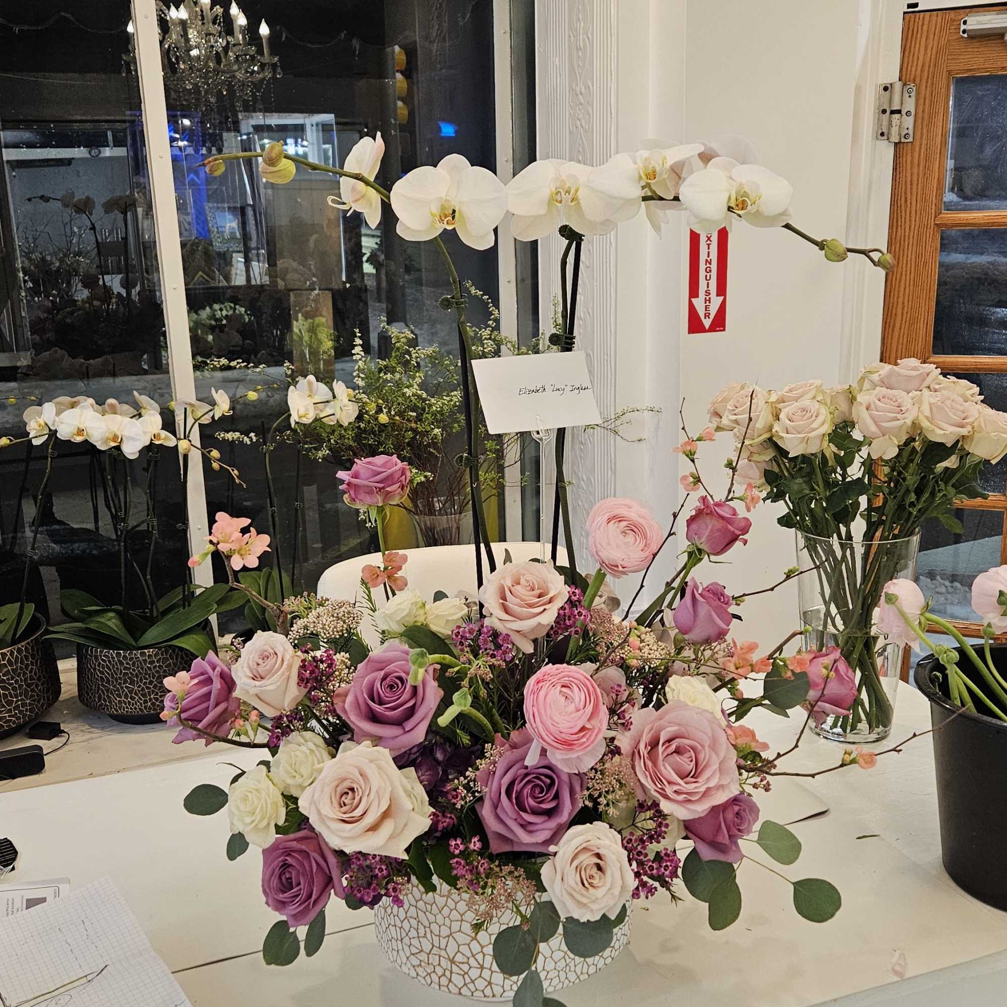 Great things about this arrangement is -
1) It has a real orchid