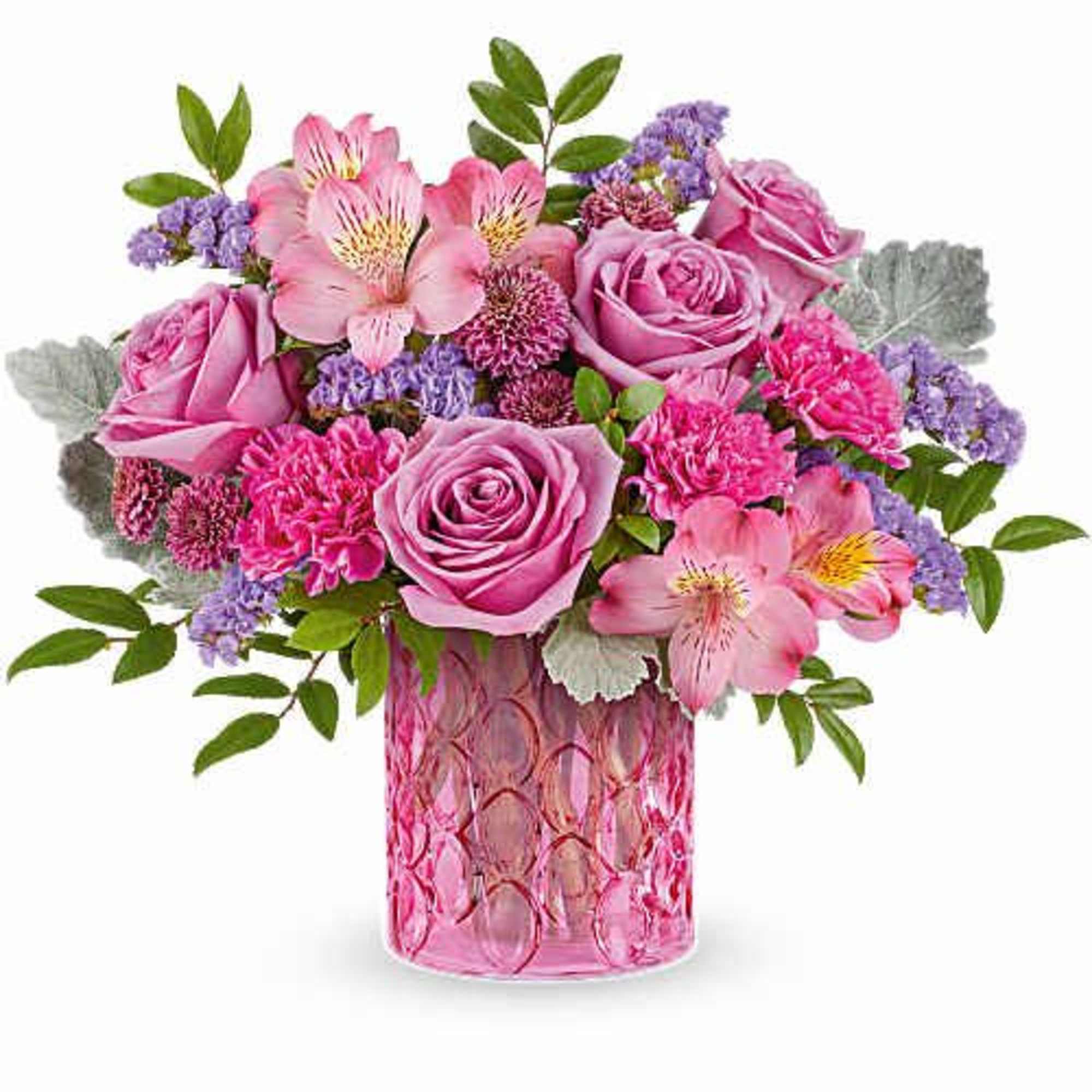 Purple roses, pink alstromeria, and purple statice in a textured pink vase.