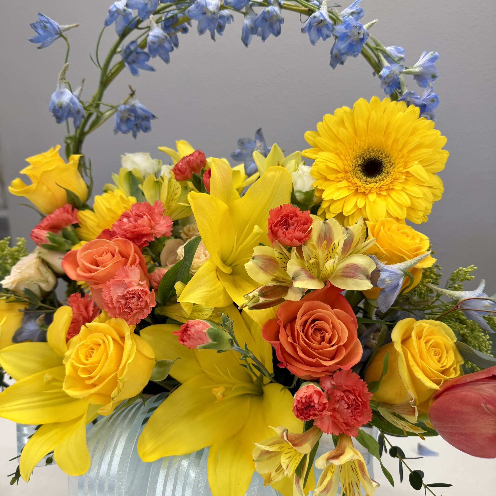 Bright, cheerful, and full of life, the Sunlit Garden Basket is a