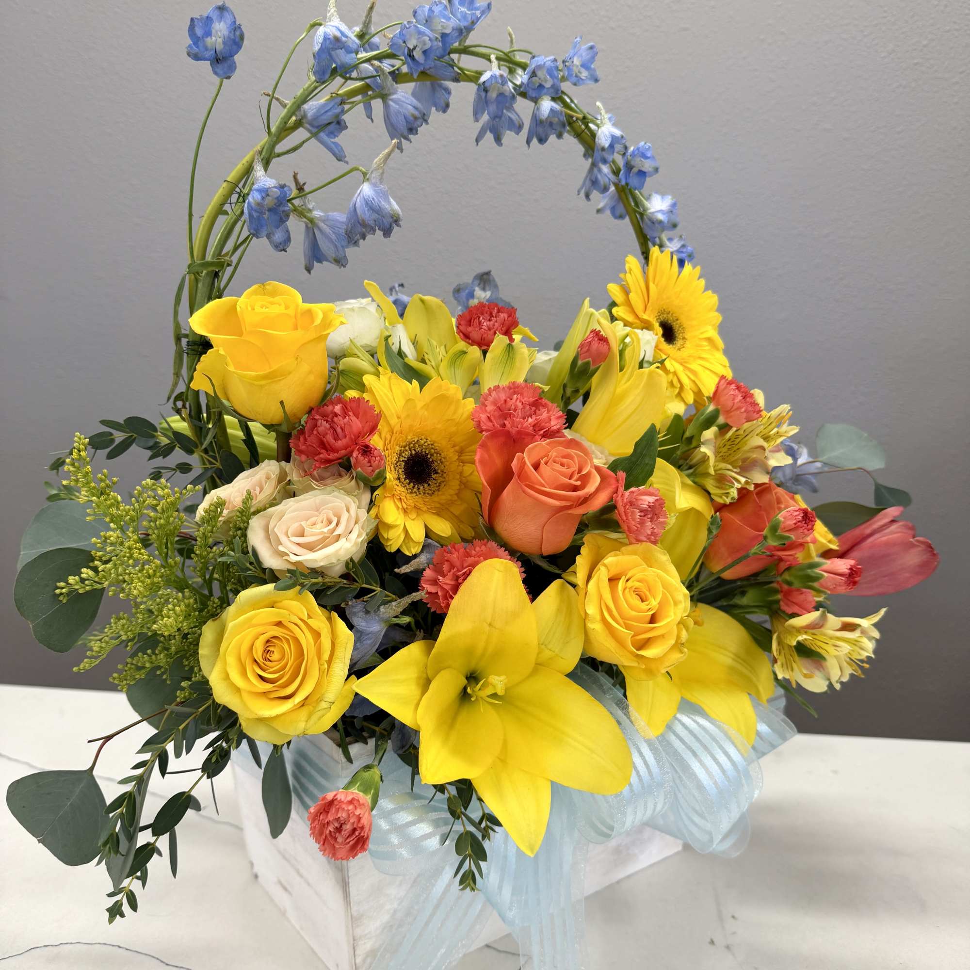 Bright, cheerful, and full of life, the Sunlit Garden Basket is a