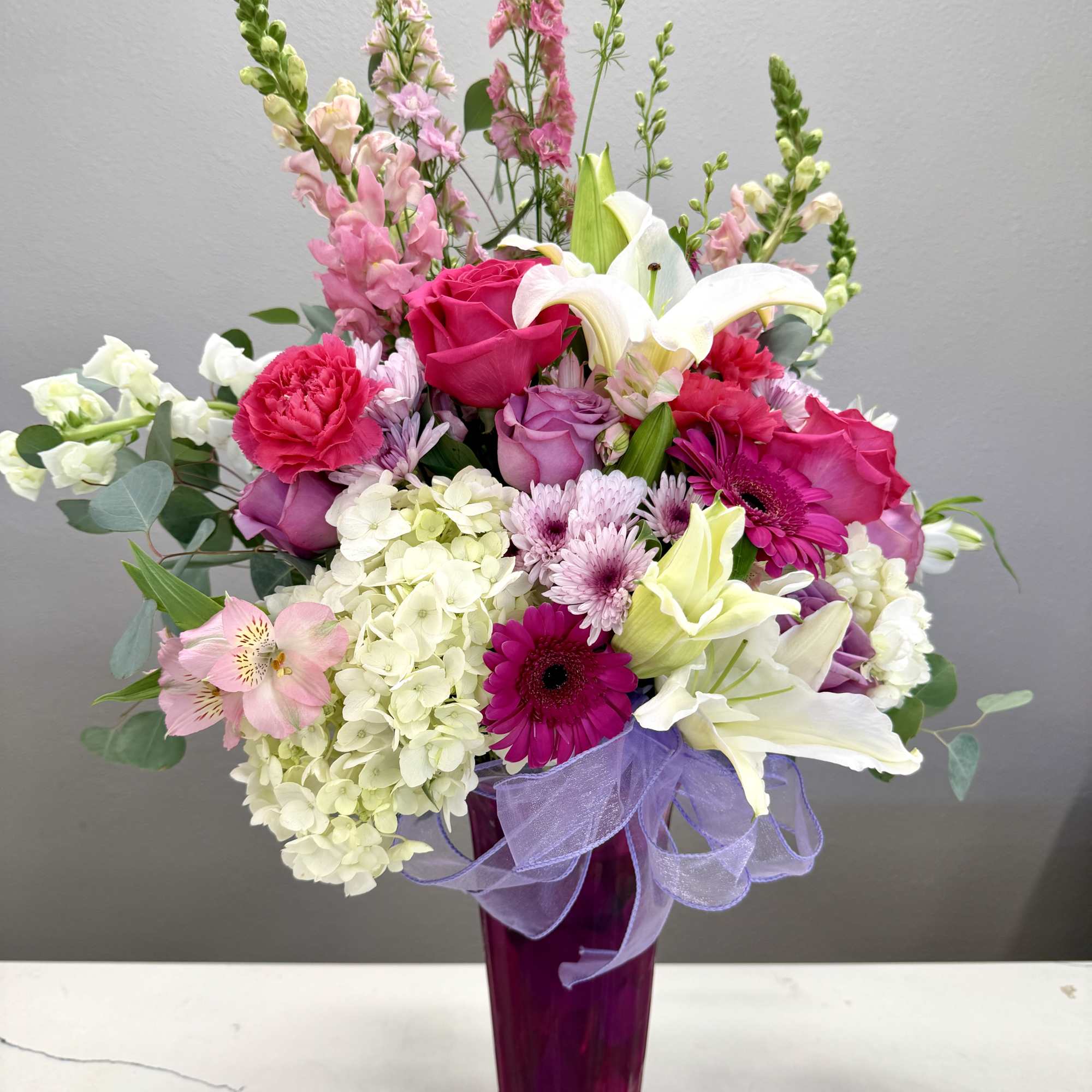 Soft, romantic, and effortlessly graceful, the Petal Symphony Bouquet is a stunning