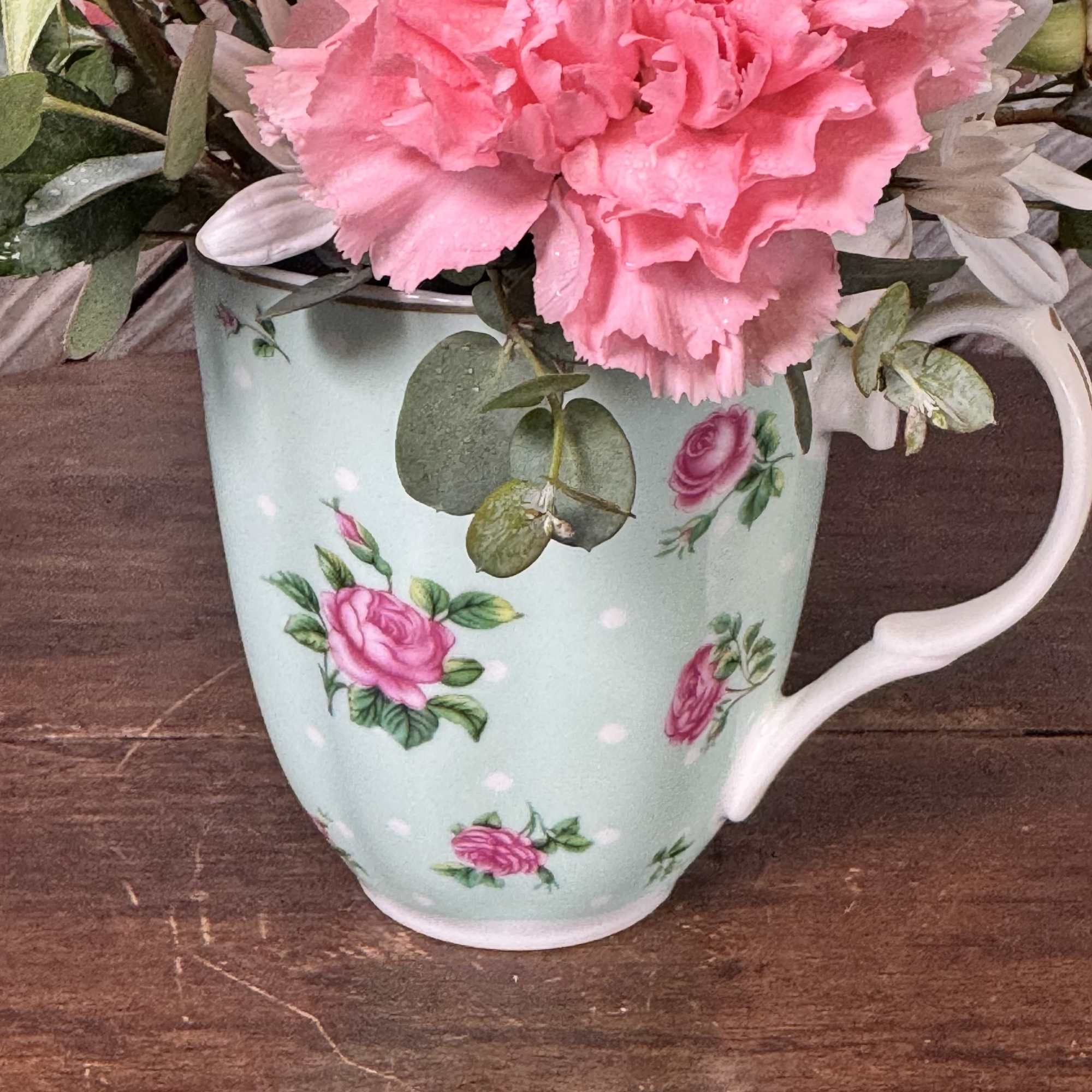 A sweet little cup filled with love  Designed in a vintage-inspired
