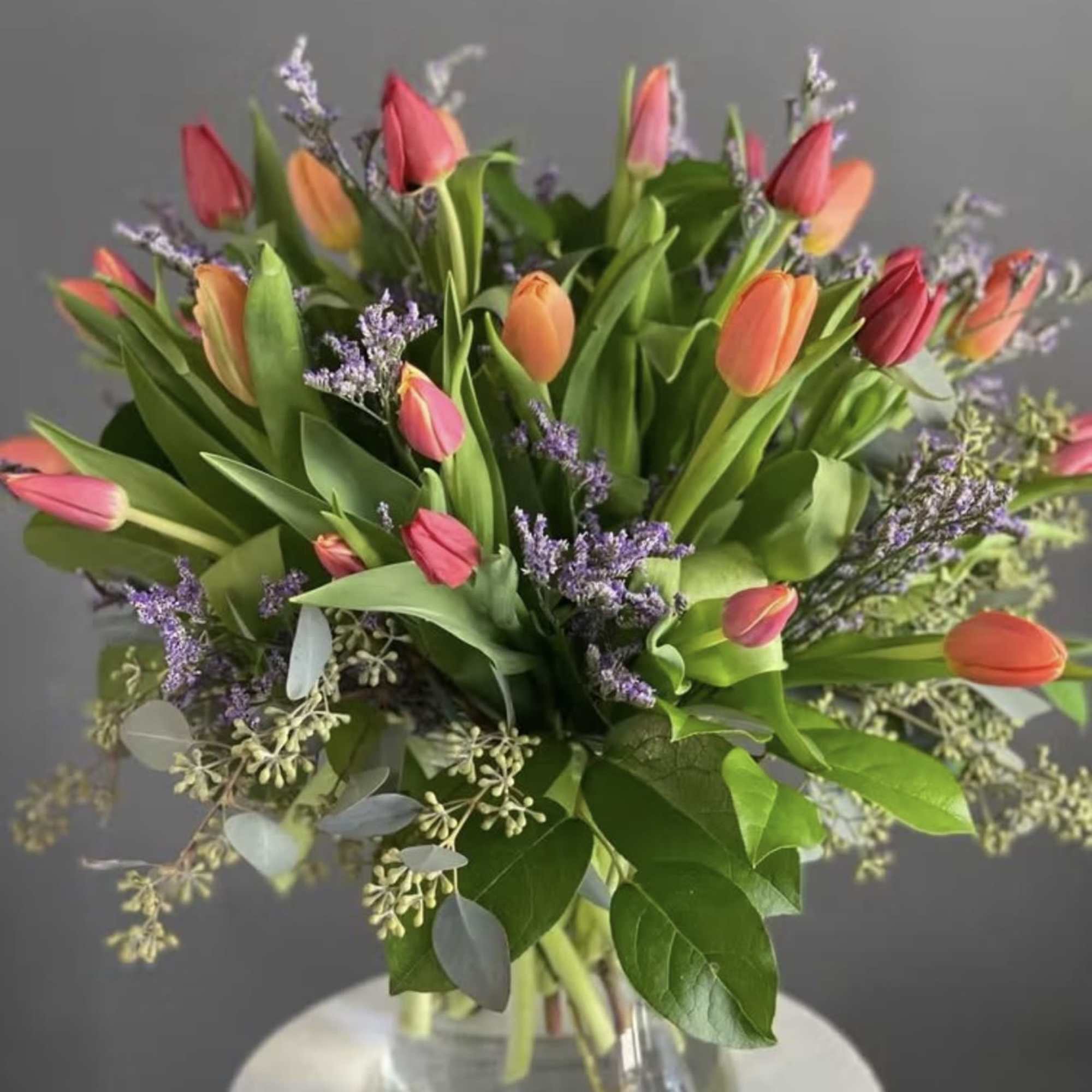 A lively cluster of multicolored tulips creates an immediate fresh-spring impression-the perfect