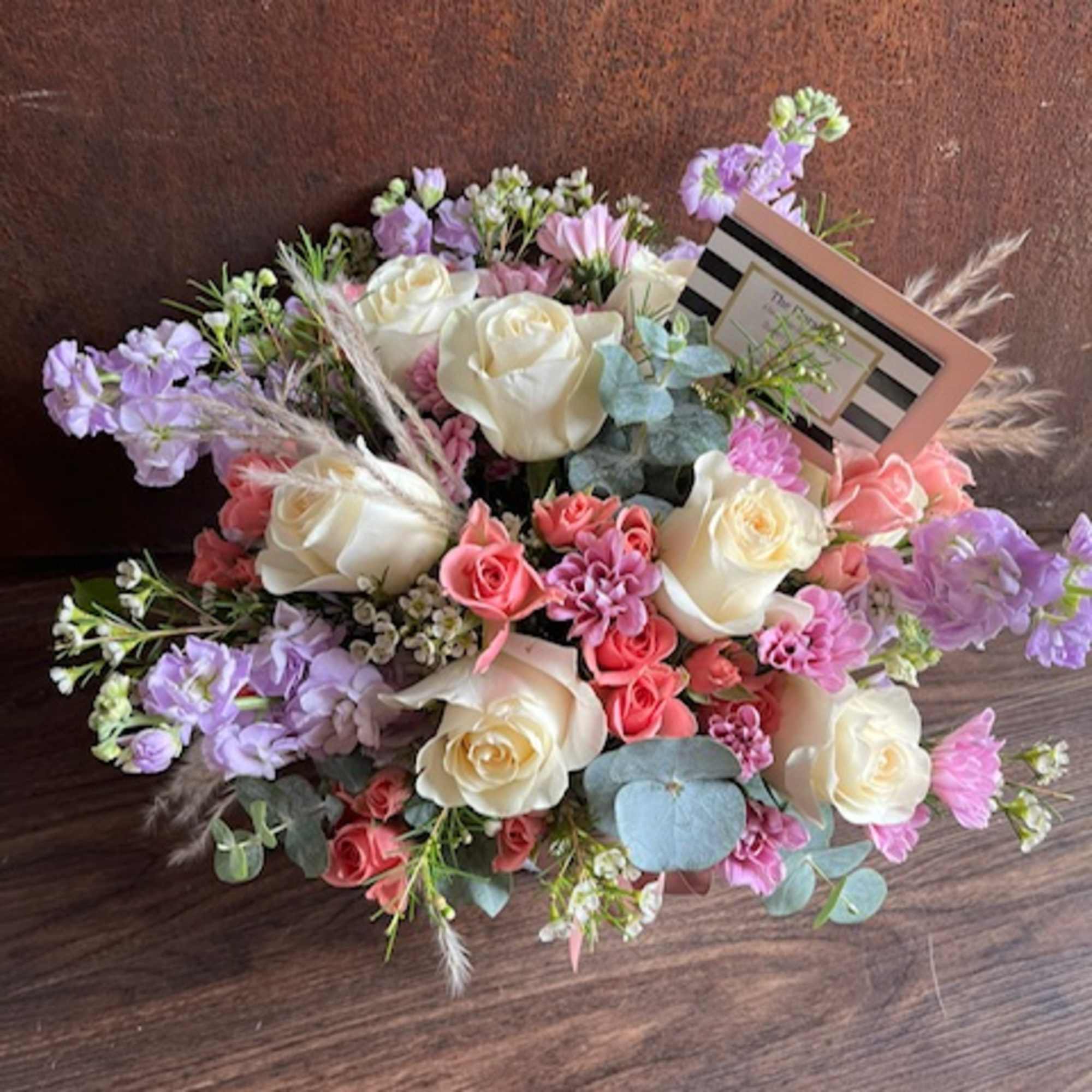 Bouquet of white and pink roses with lavender flowers and eucalyptus