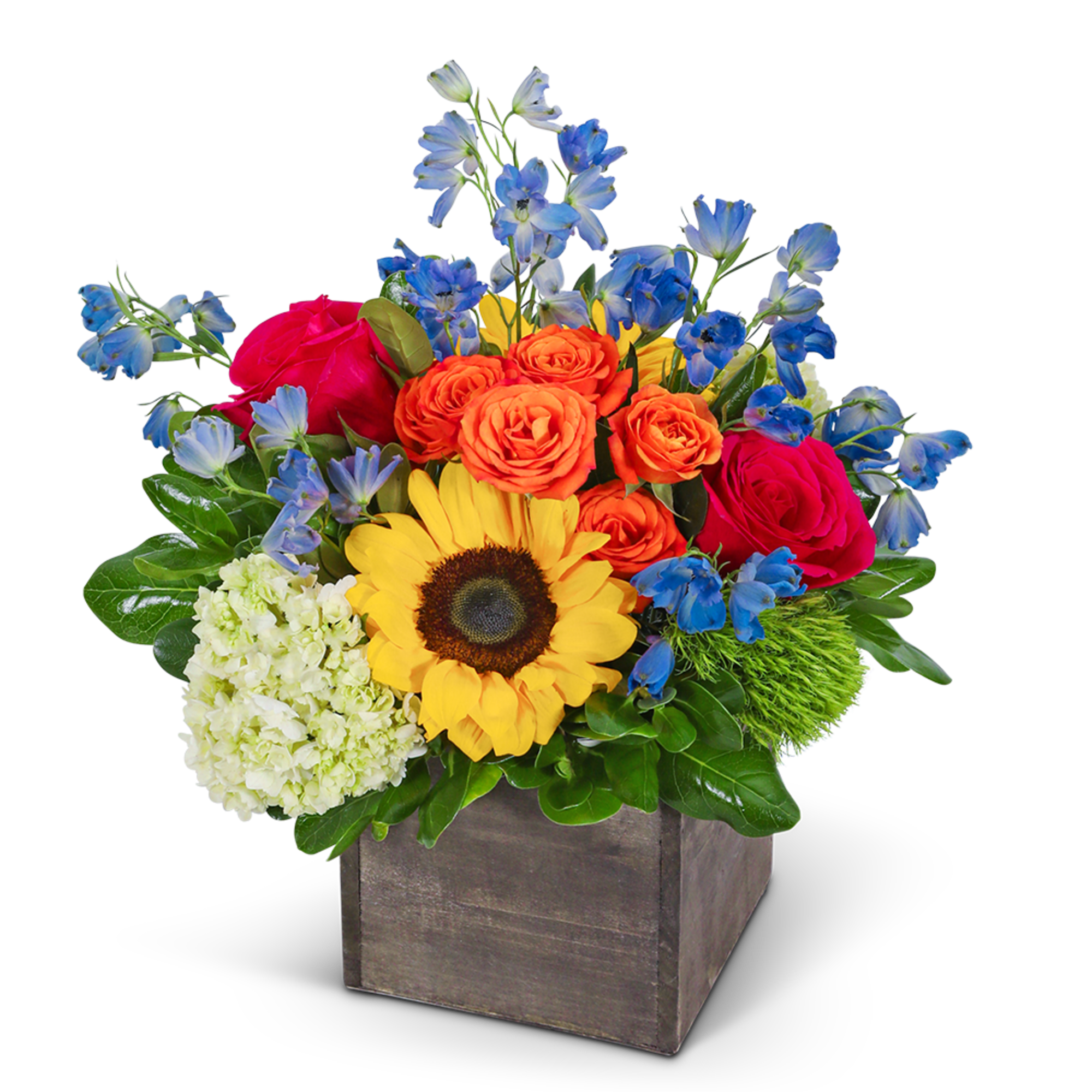 Bright mixed bouquet in a square wooden box with sunflowers, roses, and blue flowers