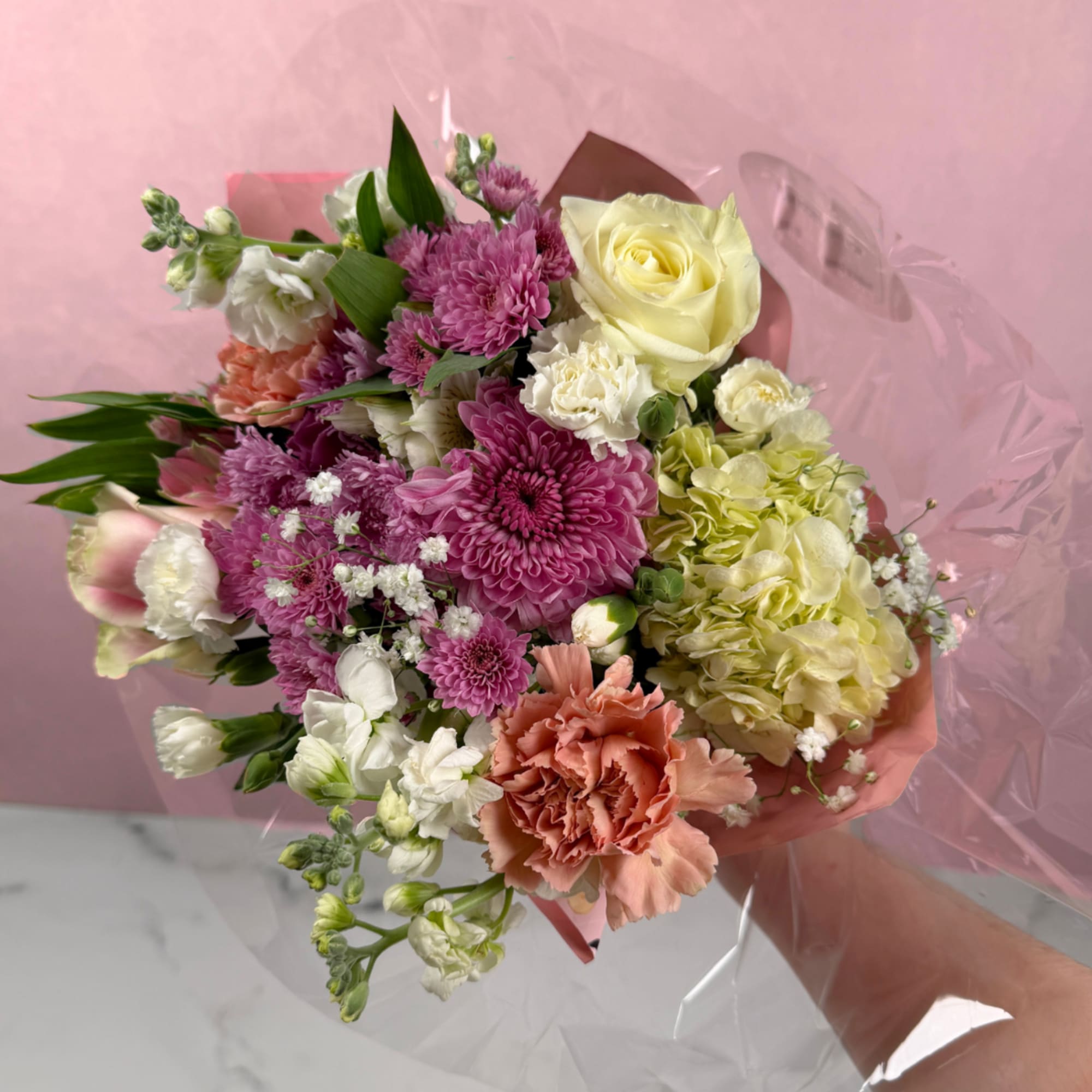 Our Soft &amp; Sentimental Wrapped Bouquet features a gentle blend of blush