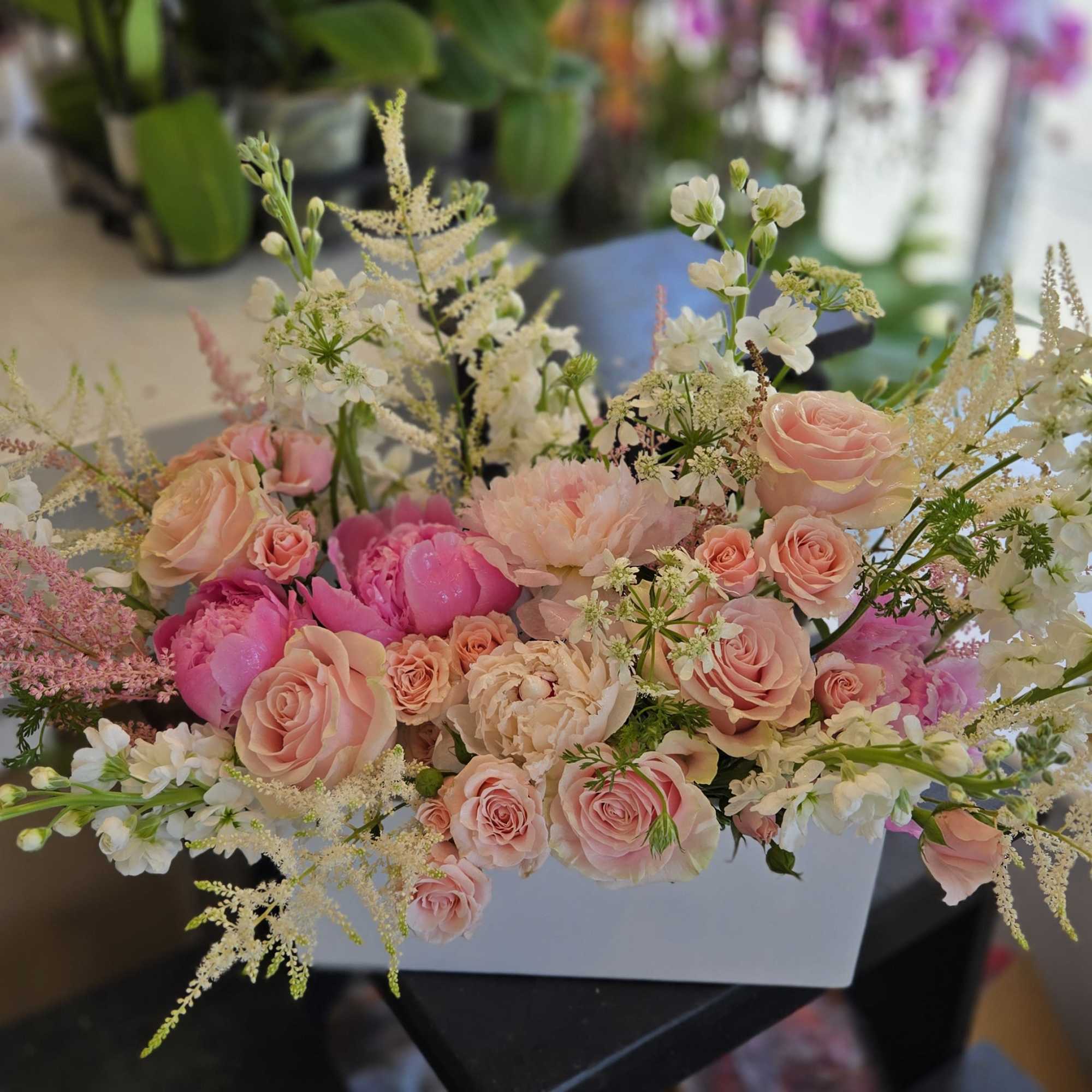 A beautiful Mother&rsquo;s Day arrangement featuring fresh seasonal blooms in a soft