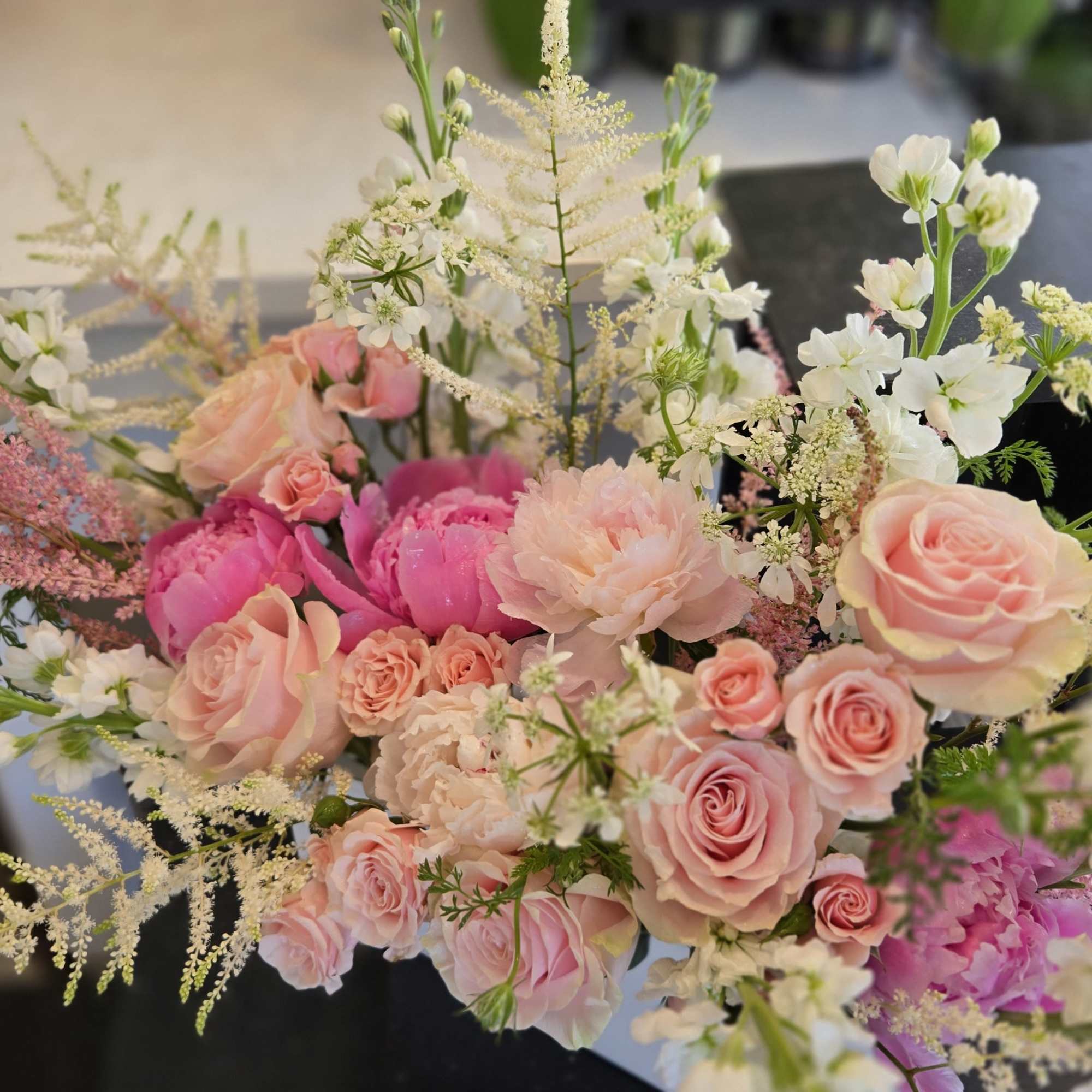 A beautiful Mother&rsquo;s Day arrangement featuring fresh seasonal blooms in a soft