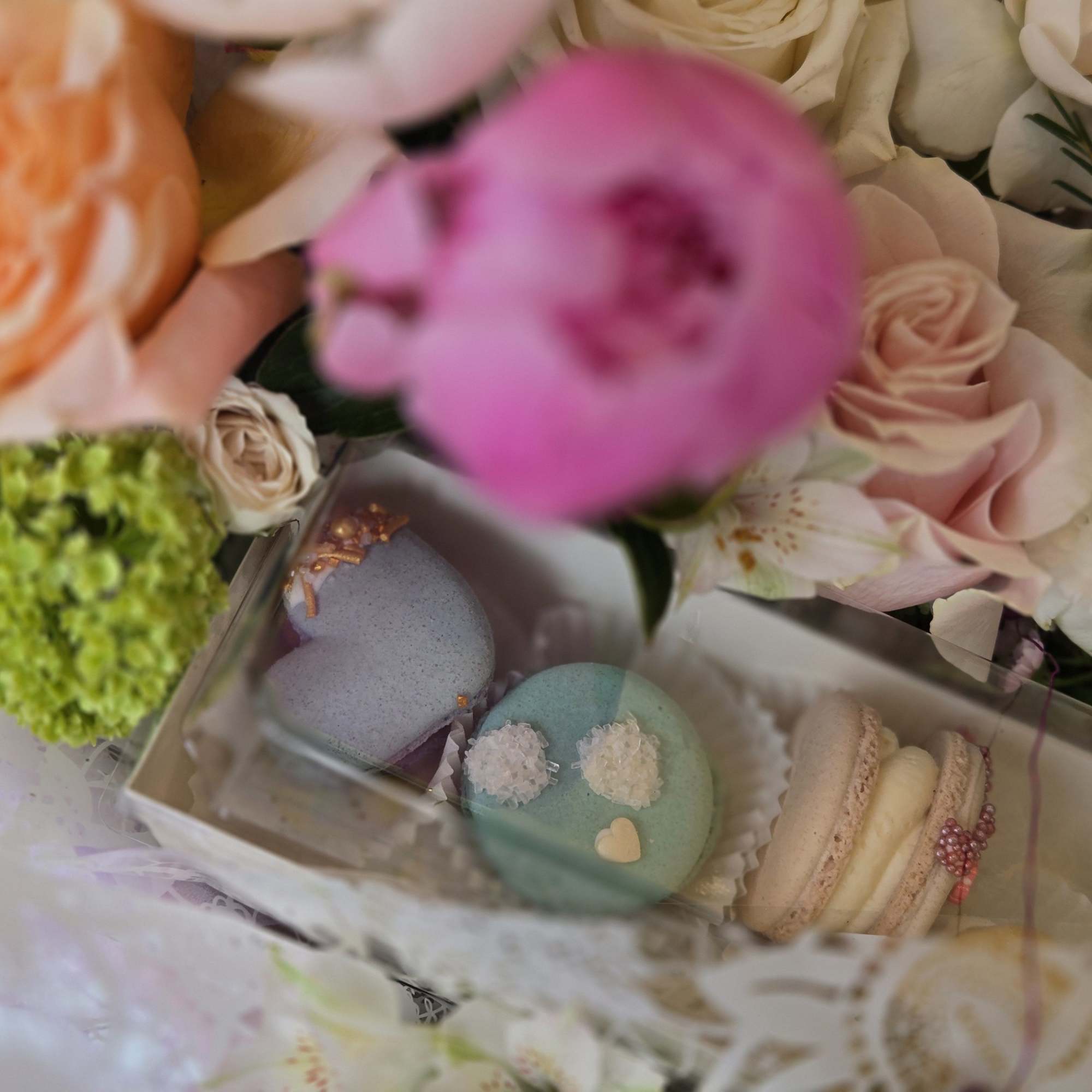 A special Mother&rsquo;s Day flower basket paired with delicate macarons, creating a