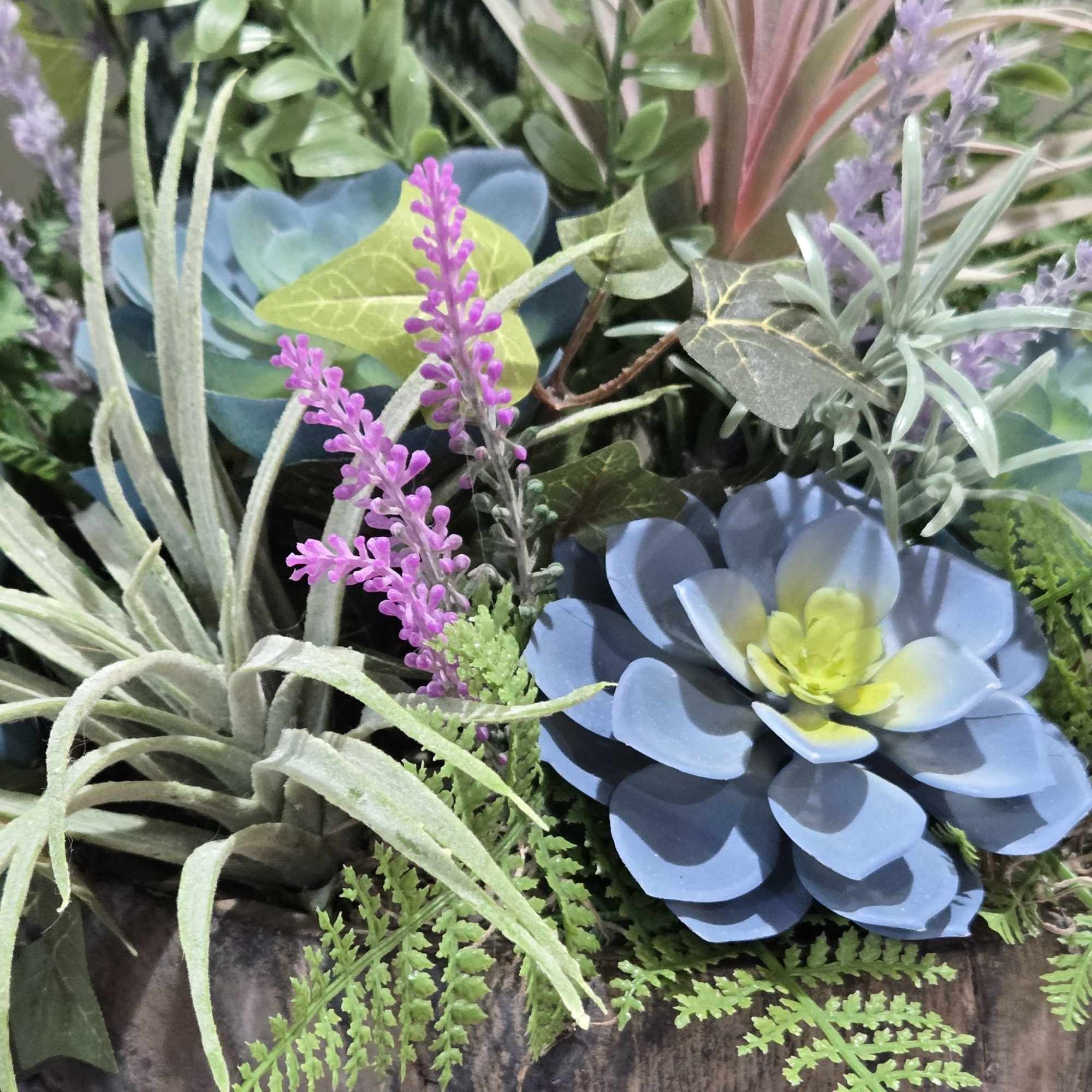 Faux Botanical planter. Stunningly designed with quality, life-like ferns, snake &amp; air