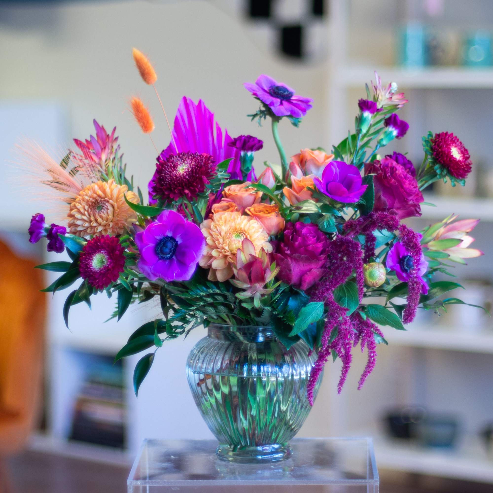 Colorful mixed bouquet in a glass vase
