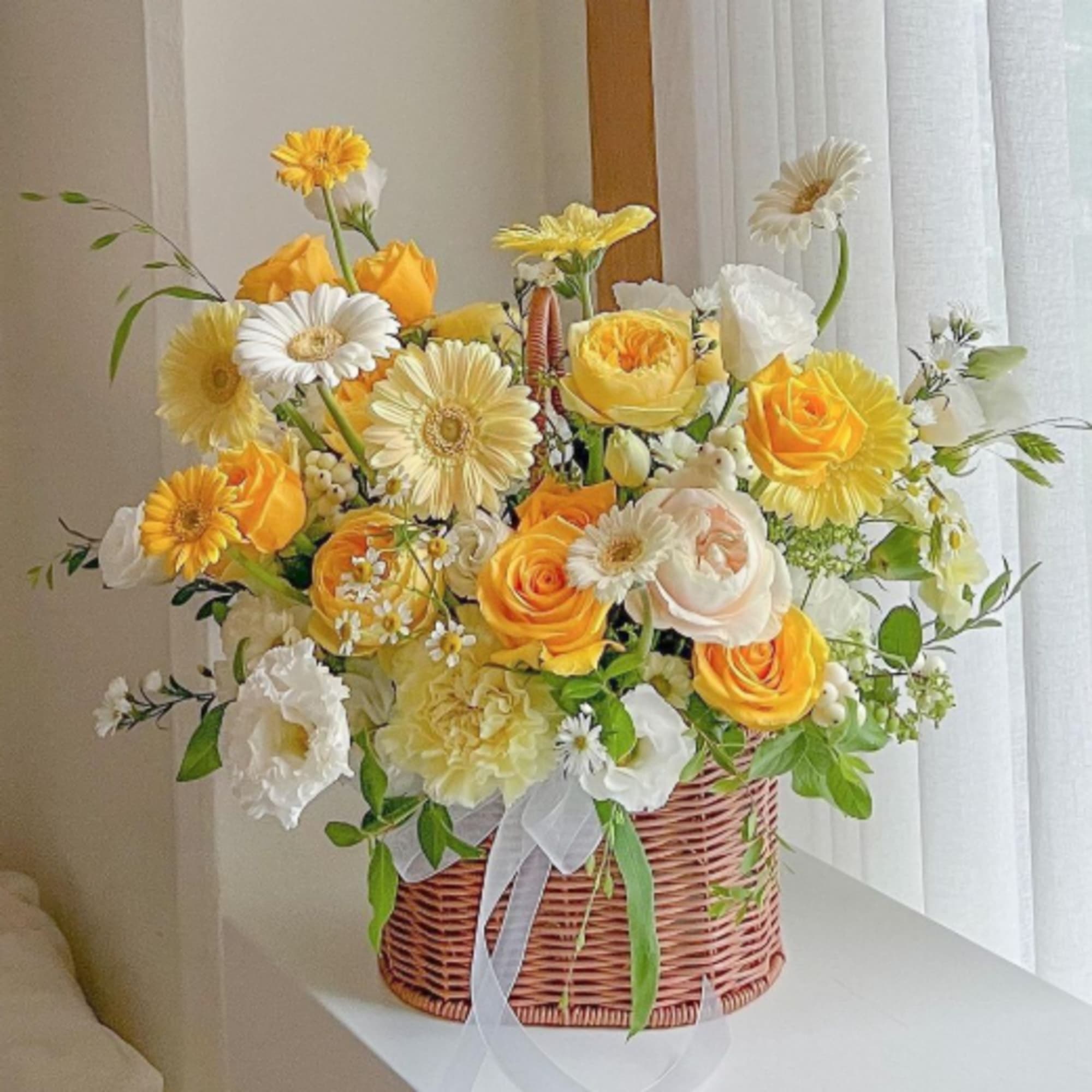 Our designer will create a gorgeous summery mix of beautiful, bright summer