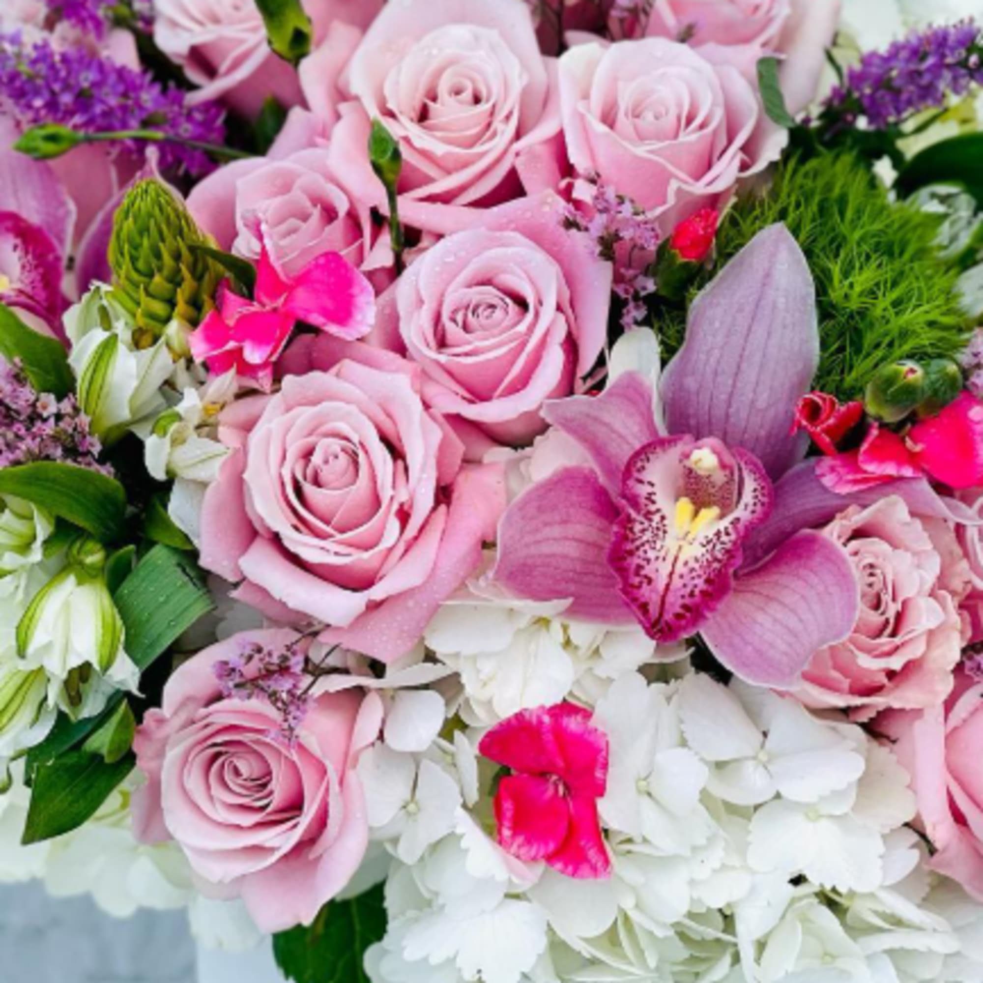 Looking to send flowers to MOM? Let our professional floral designer create