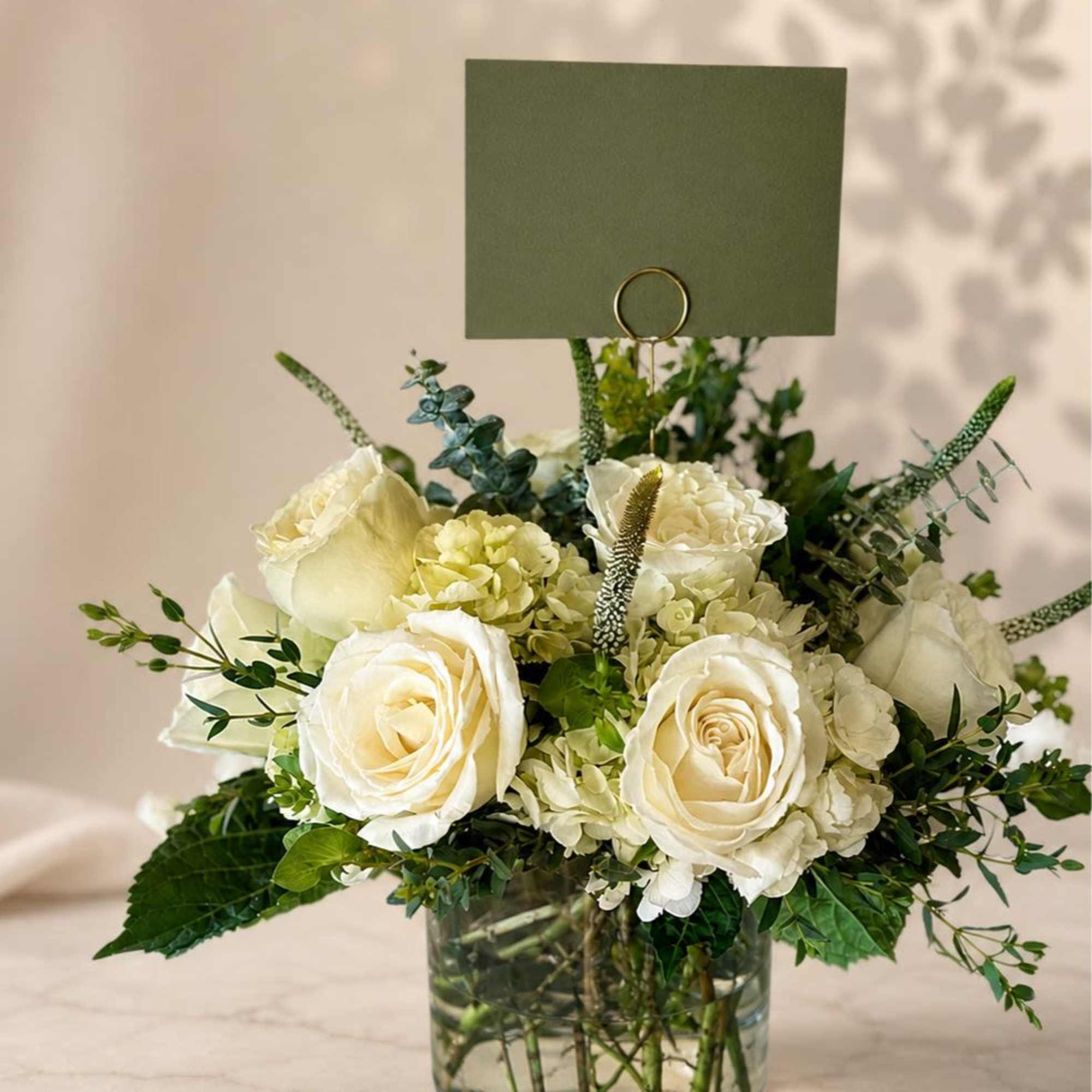 Designed with a curated selection of seasonal blooms for an elegant and