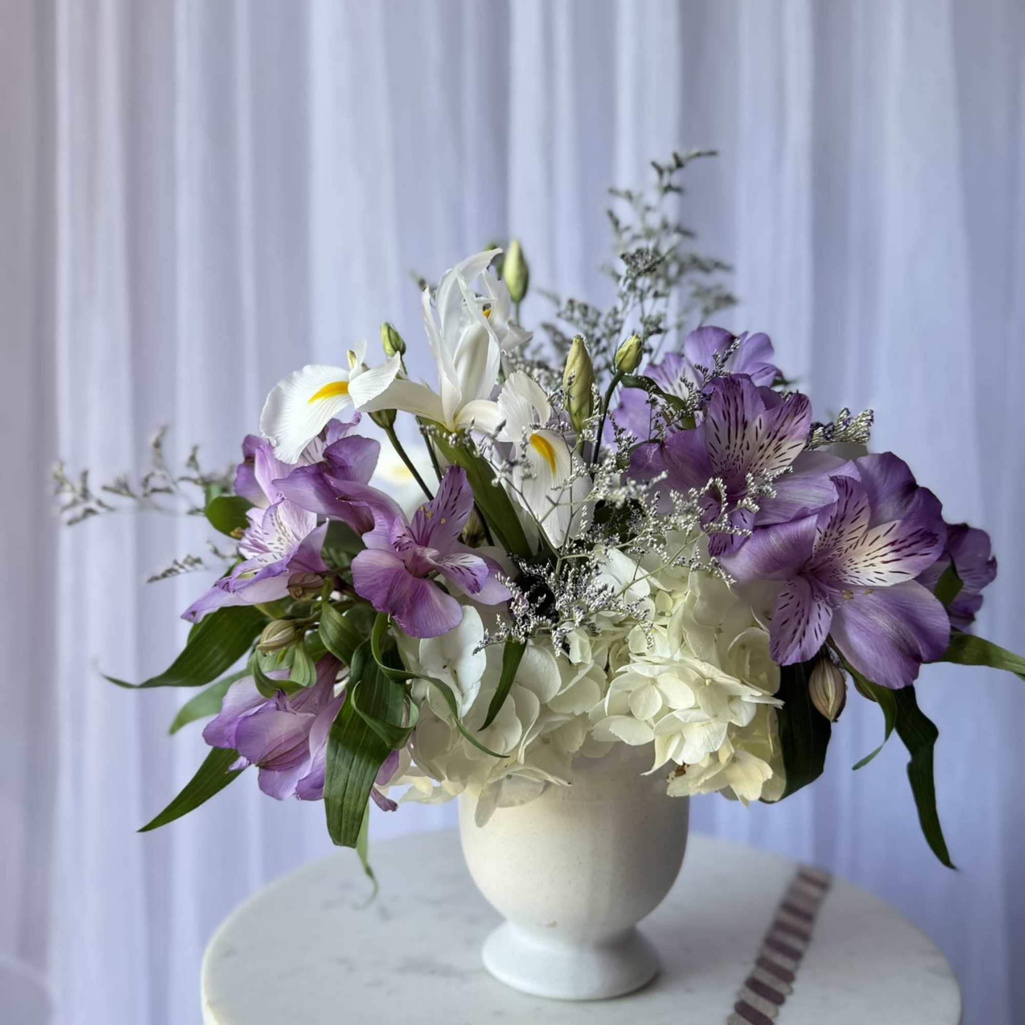 A delicate composition that speaks in soft tones and graceful textures. Lavender