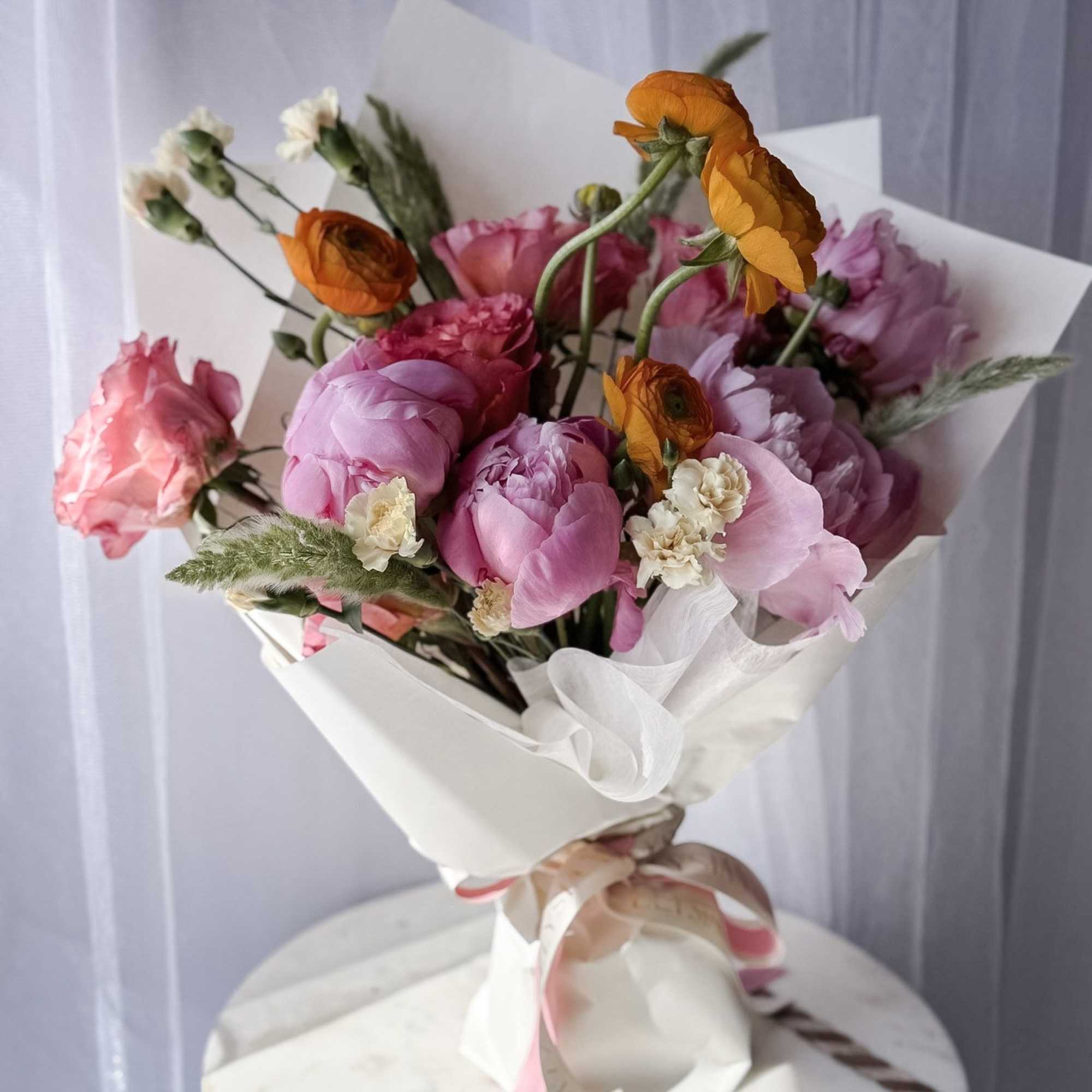 A joyful, garden-inspired bouquet that feels like a warm breeze on a