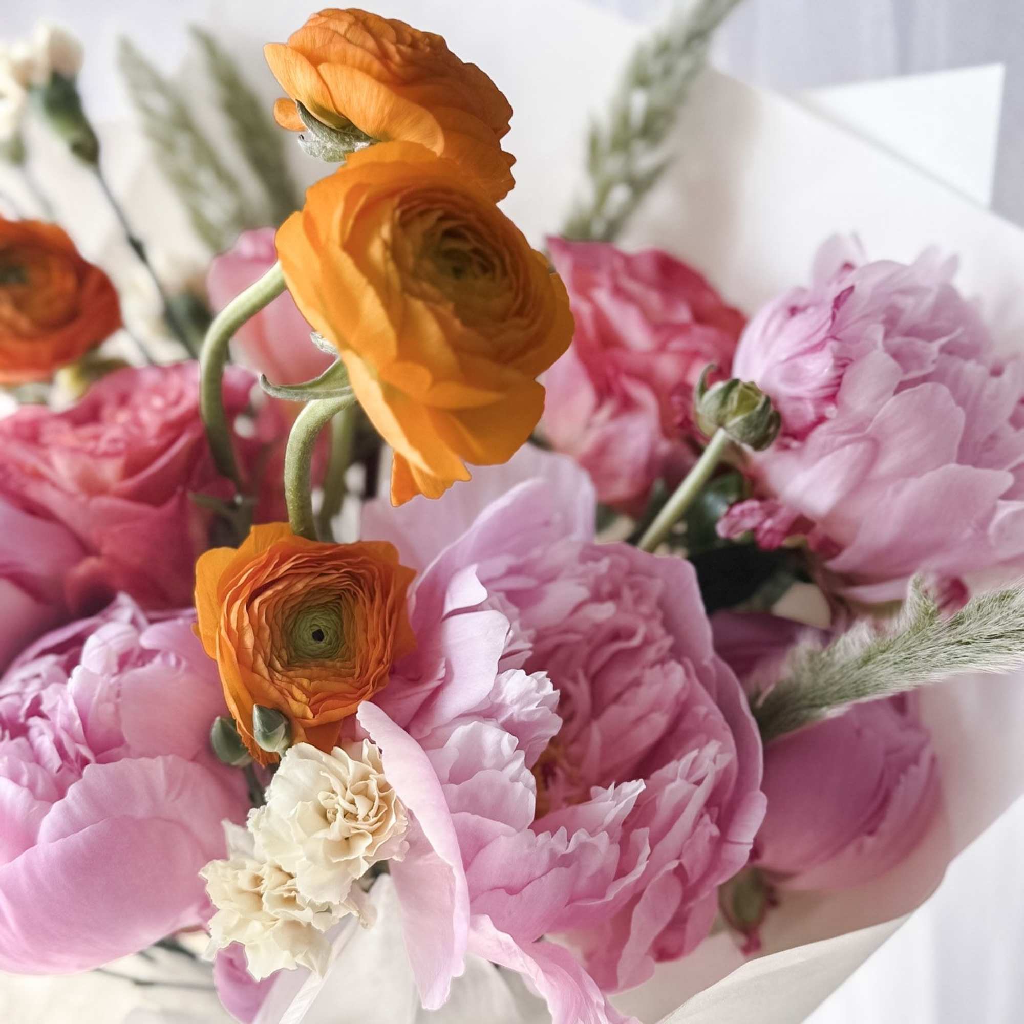 A joyful, garden-inspired bouquet that feels like a warm breeze on a