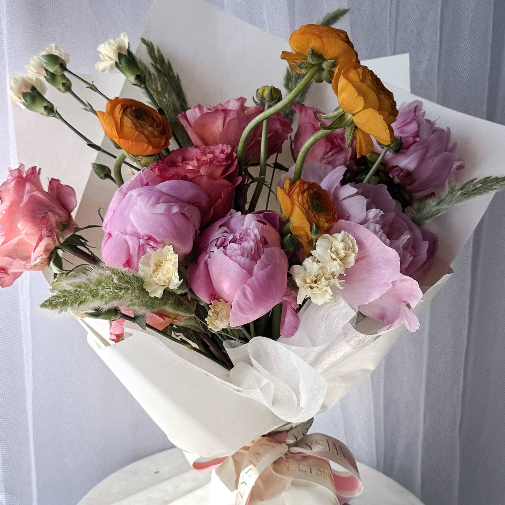 A joyful, garden-inspired bouquet that feels like a warm breeze on a