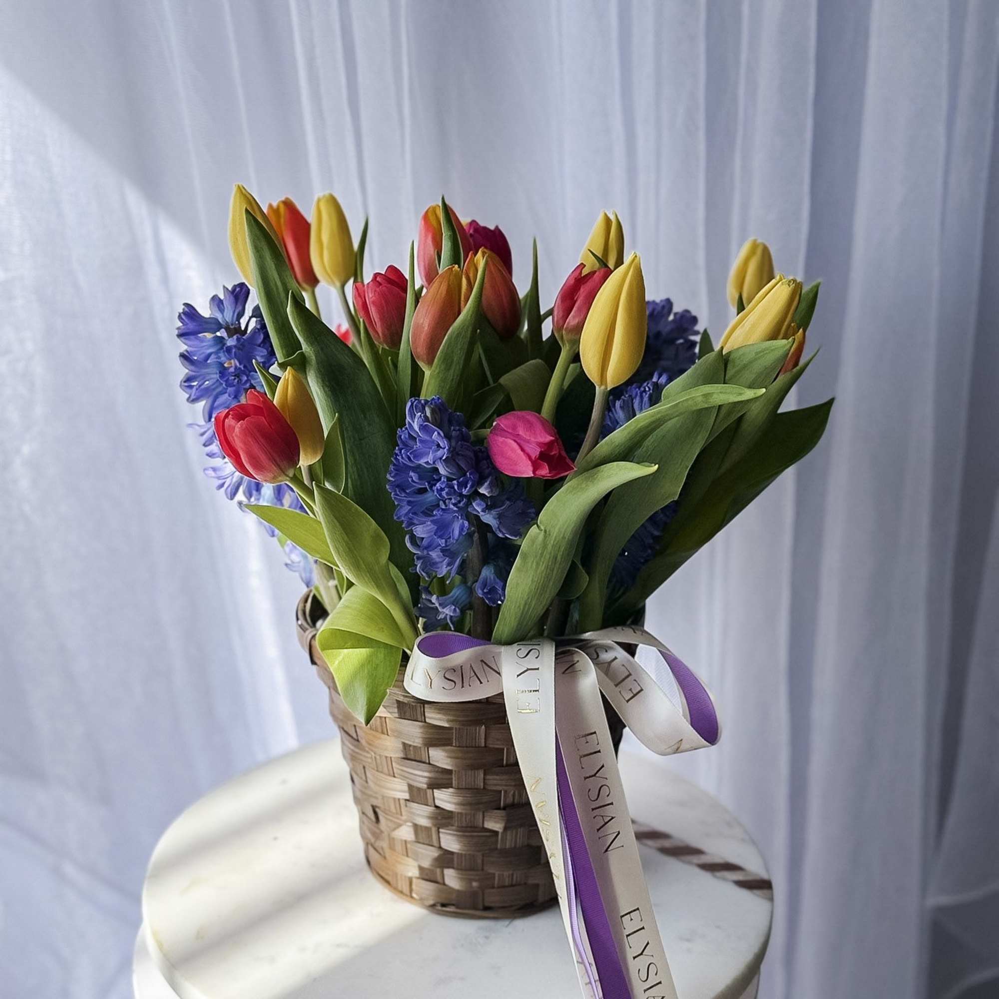 A cheerful symphony of color and texture, Spring Melody Basket captures the