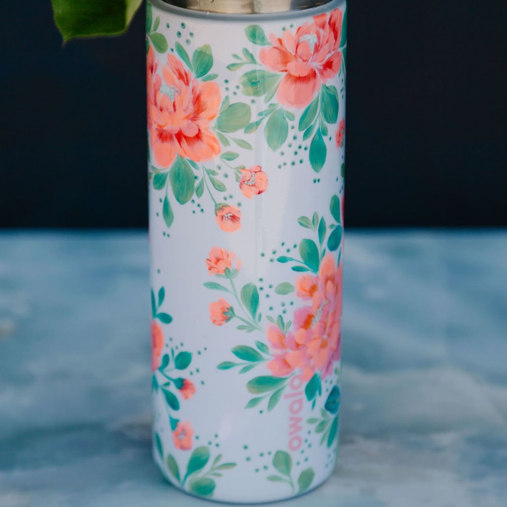 This tumbler is a one-of-a-kind, hand-painted piece sealed with a clear gloss